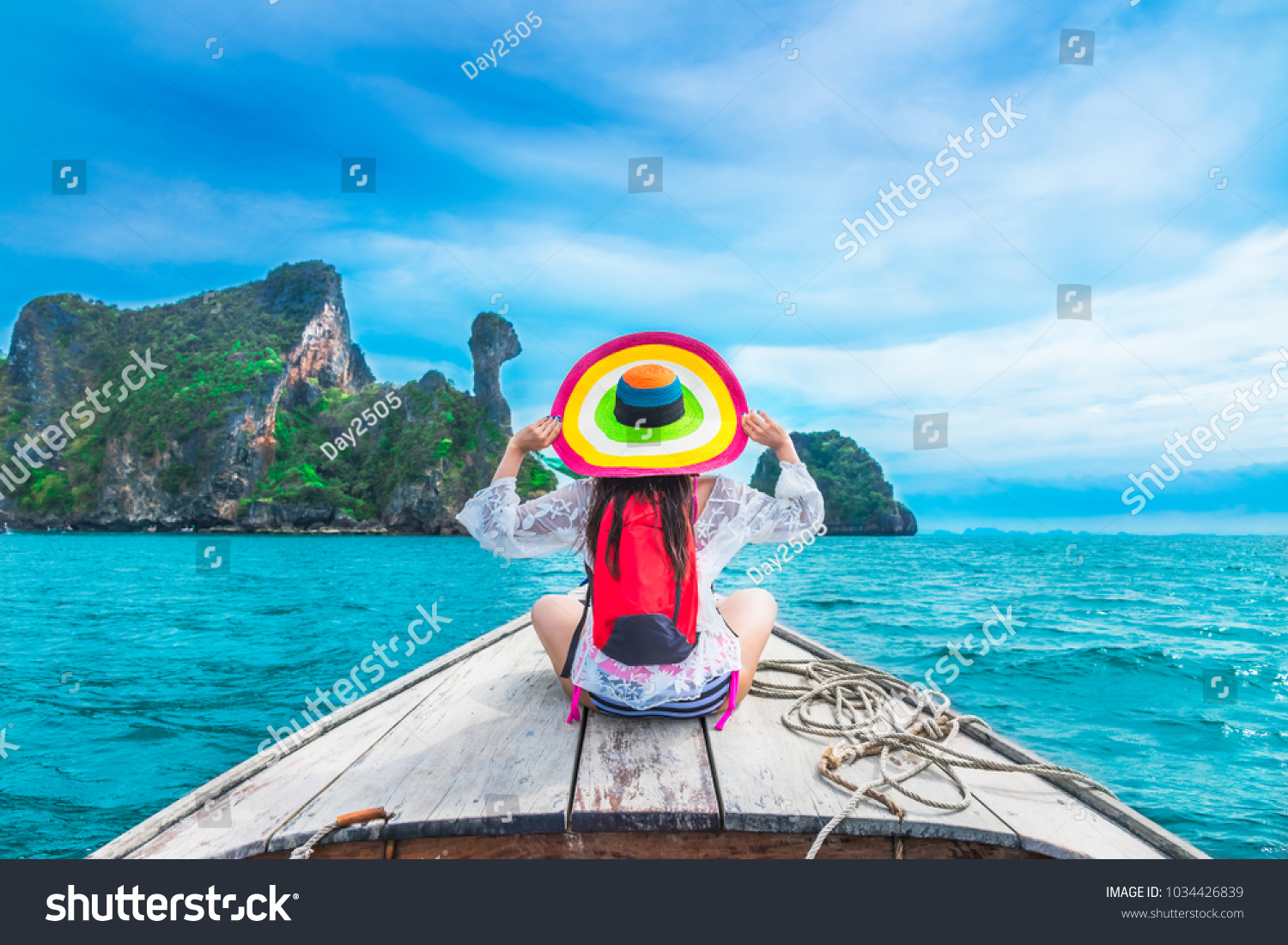 Summer lifestyle traveler woman in bikini and big hat joy relaxing on boat, Kai island, Andaman sea, Krabi, Travel Thailand, Beautiful destination landscape Asia, Summer holiday outdoor vacation trip #1034426839