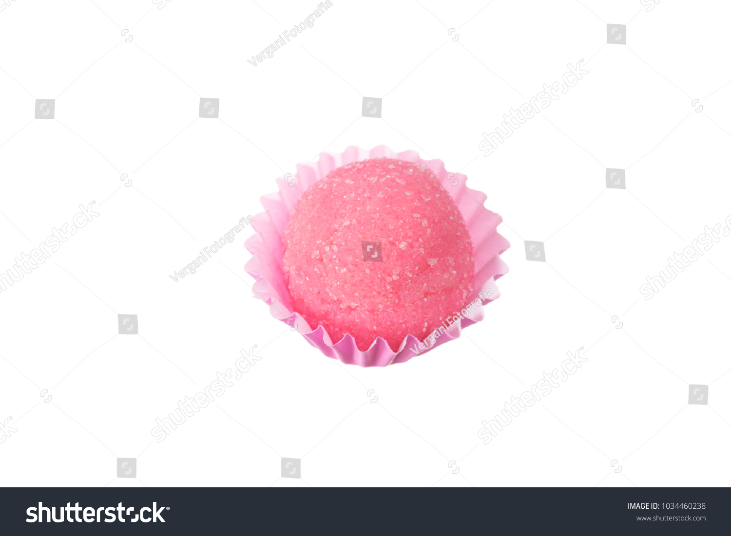 Bicho de pe is a strawberry flovoured brazilian candy. Common in children birthday parties sweet. Overhead of candy ball in white background. #1034460238