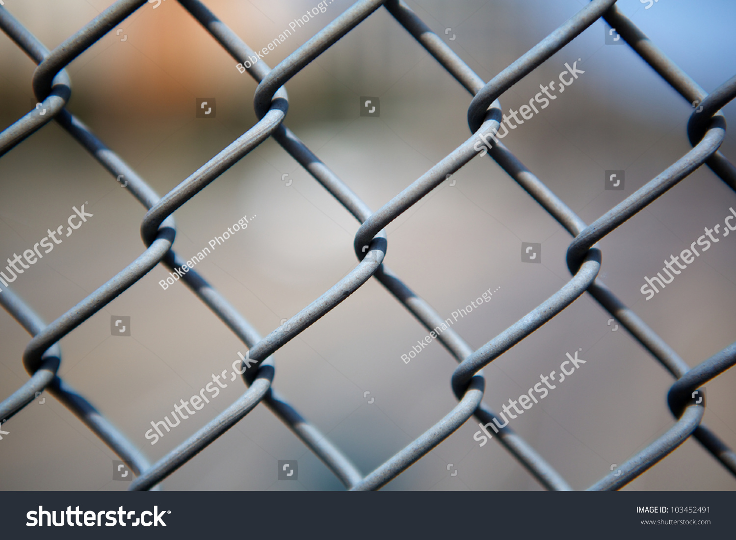 Narrow Dept of Field close up image of chain link fence #103452491