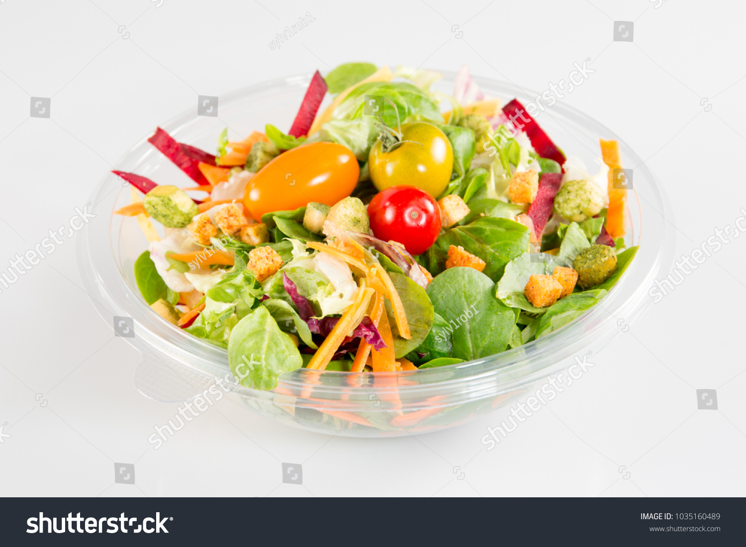 Take away salad on white background #1035160489
