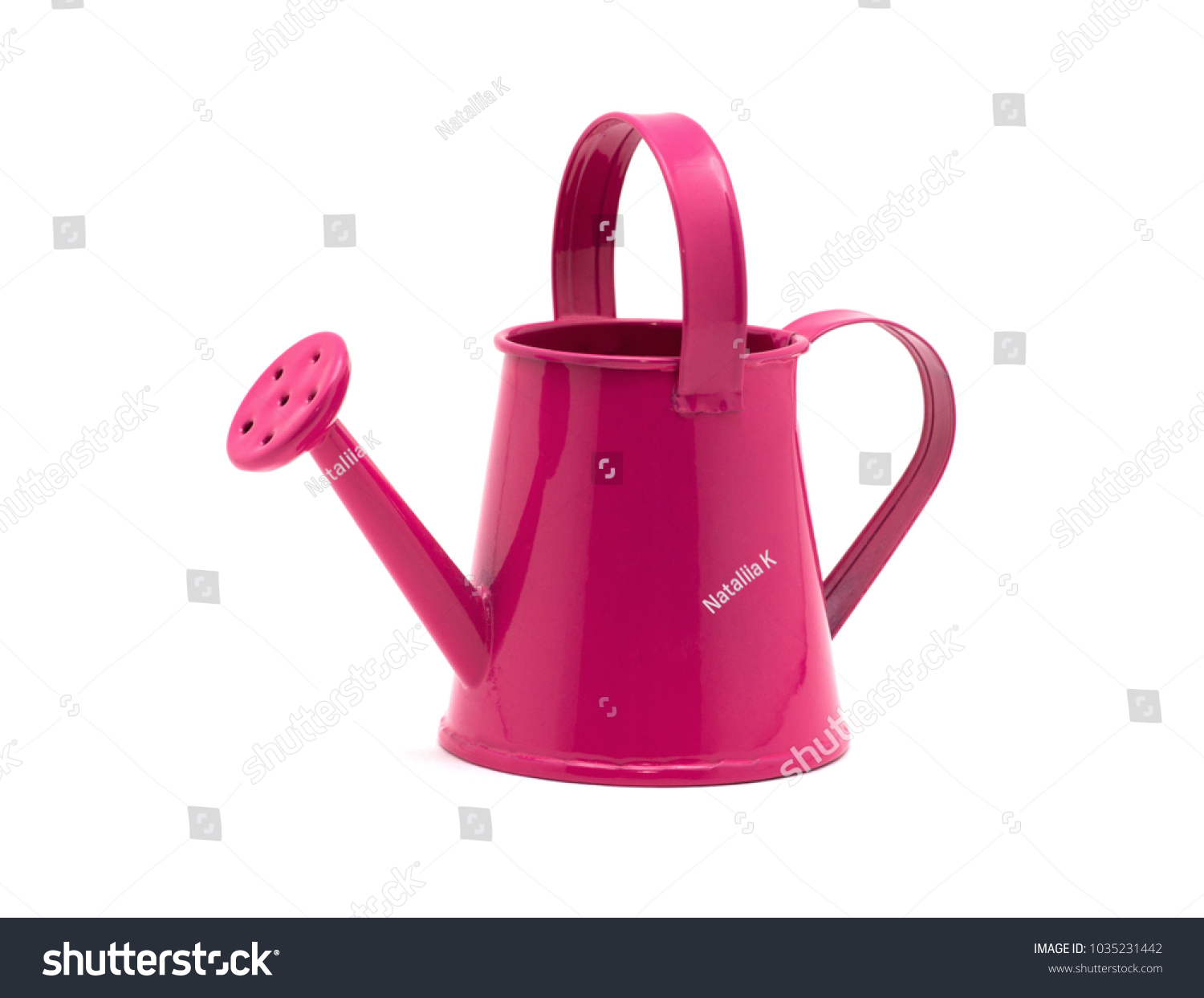 Pink watering can isolated on a white background #1035231442