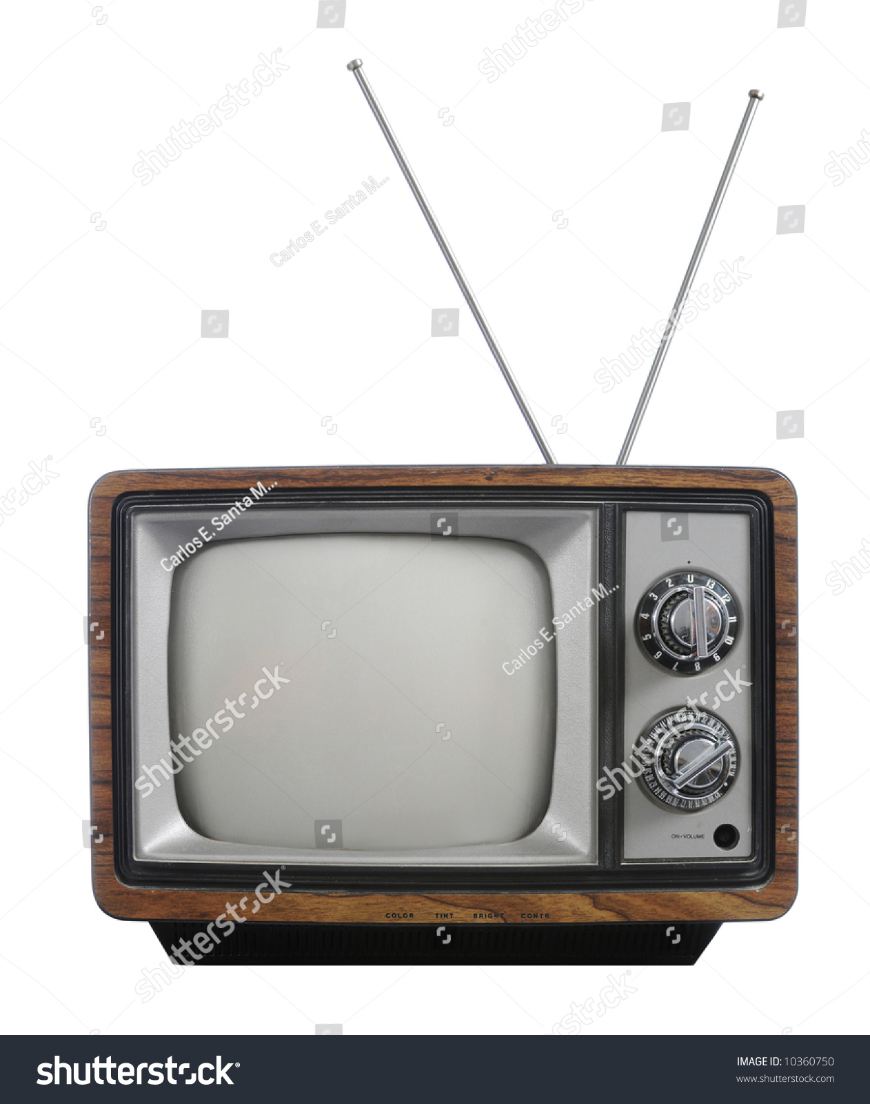 Grunge vintage television with antenna isolated on white #10360750