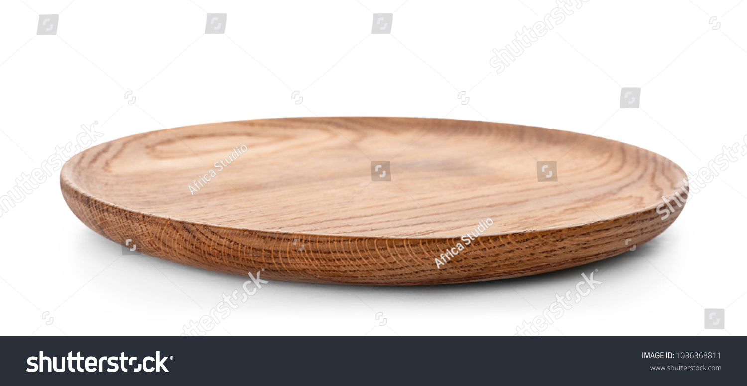 Wooden plate on white background. Handcrafted cooking utensils #1036368811