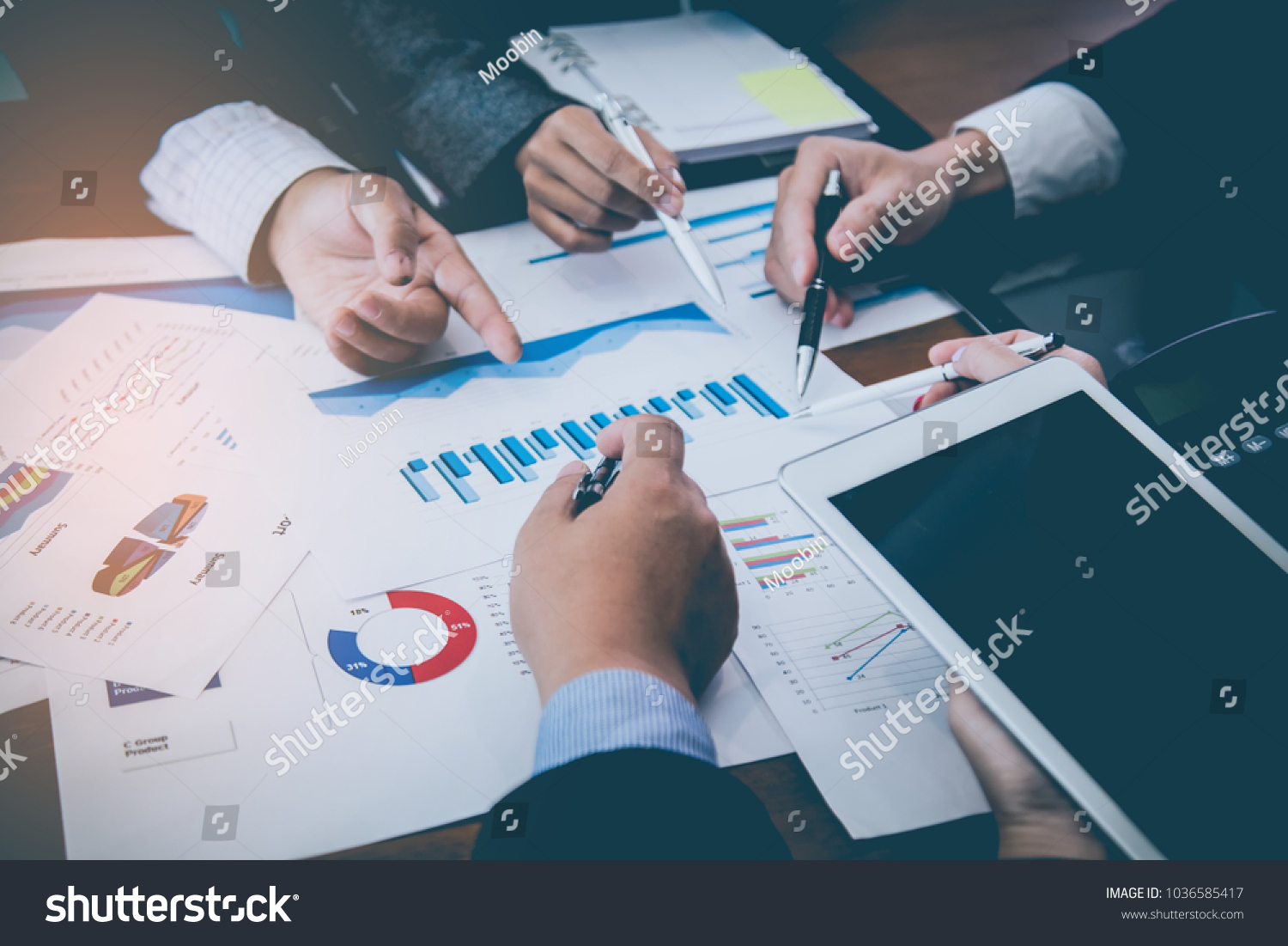 Corporate meetings, Business team organizations and investment plans at working with new startup project with chart,graph and business accessories on workplace. #1036585417
