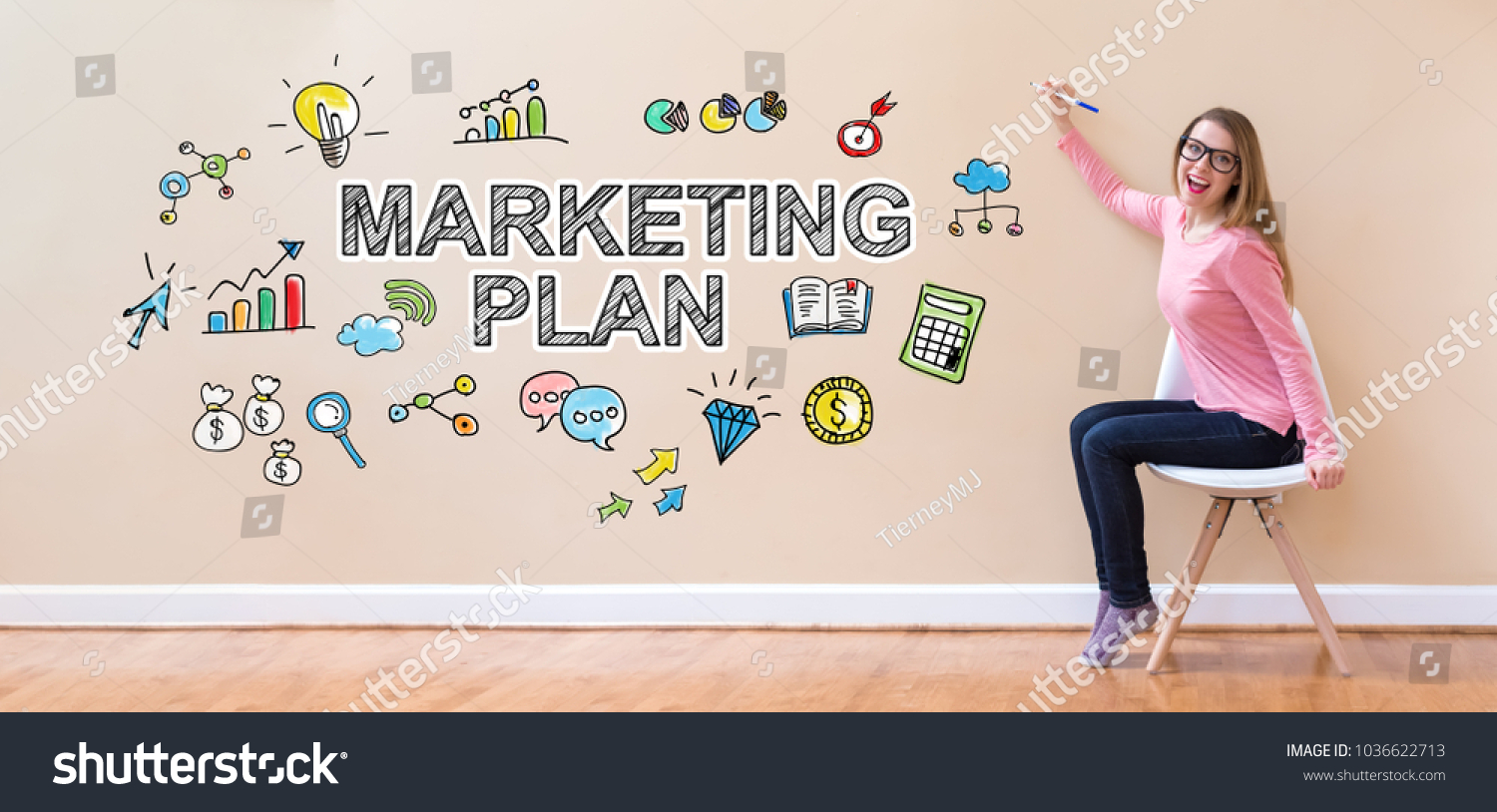 Marketing Plan with young woman holding a pen in a chair #1036622713