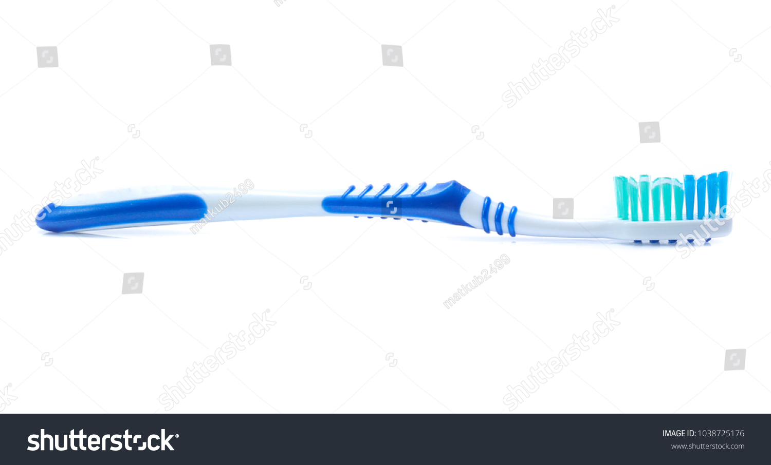 toothbrush isolated on a white background #1038725176
