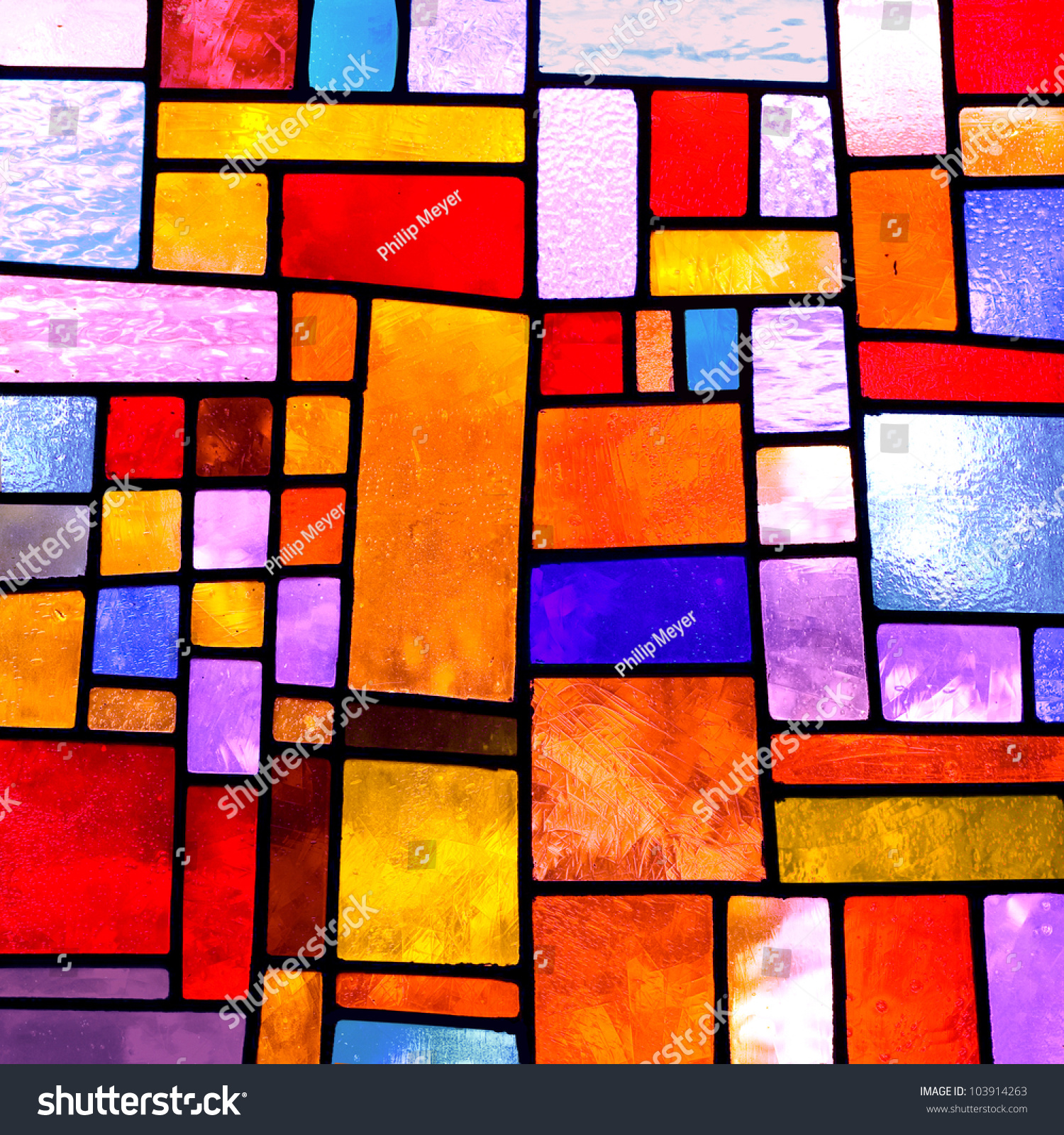 Image of a multicolored stained glass window with irregular block pattern , square format #103914263