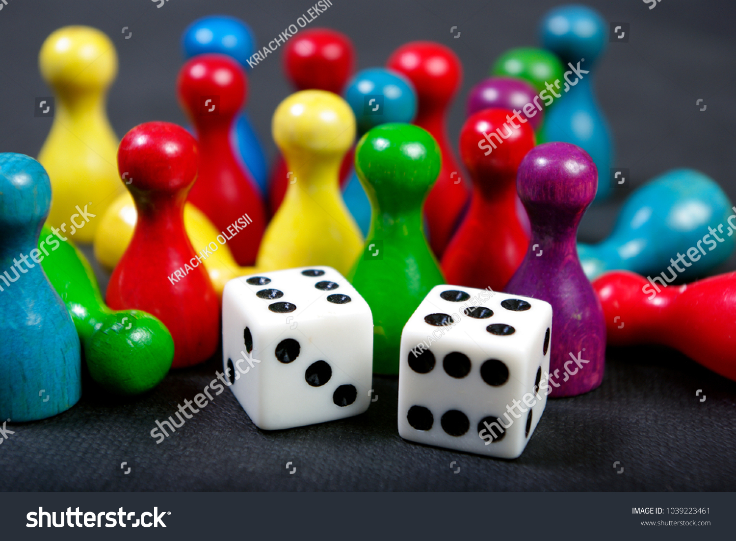 colorful play figures with dice on board #1039223461