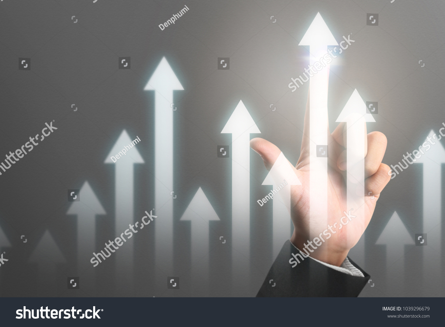 Businessman plan graph growth and increase of chart positive indicators in his business #1039296679