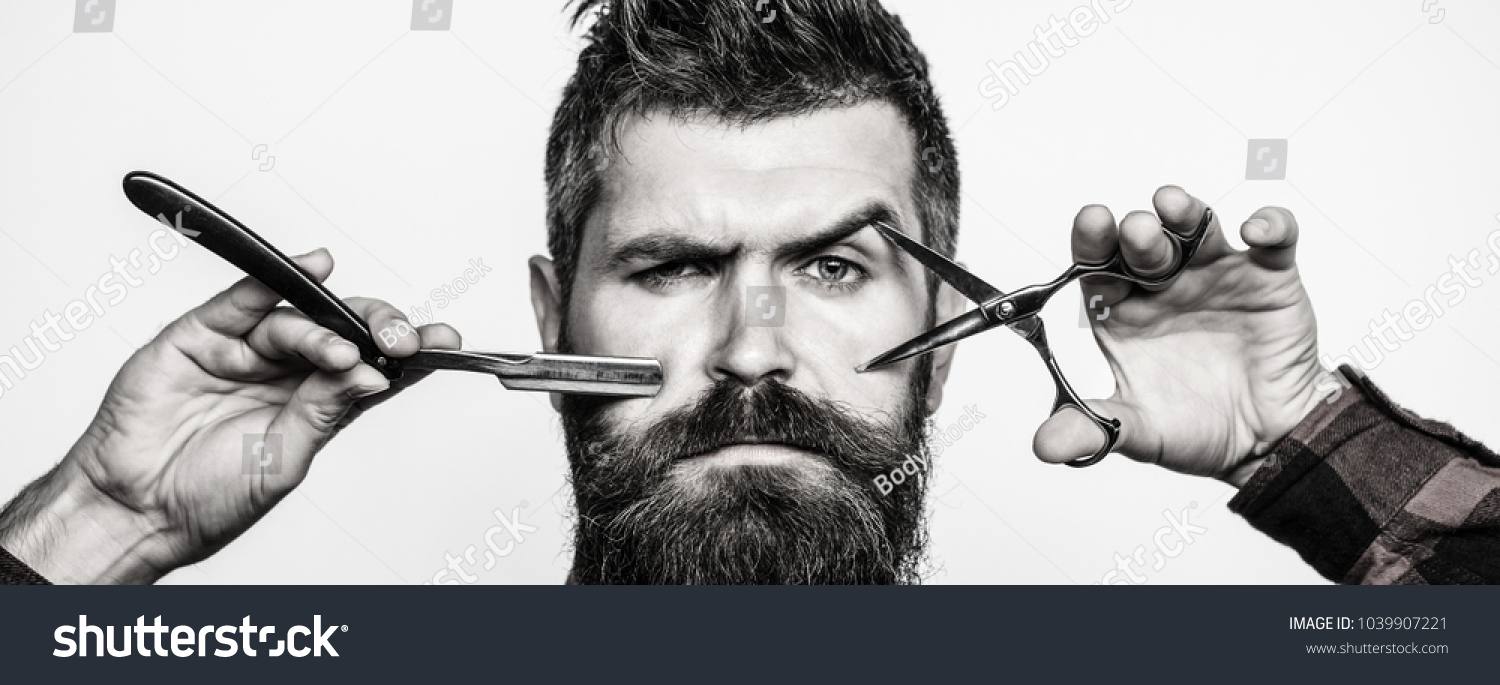 Bearded man, bearded male. Portrait of stylish man beard. Barber scissors and straight razor, barber shop. Vintage barbershop, shaving. Black and white #1039907221