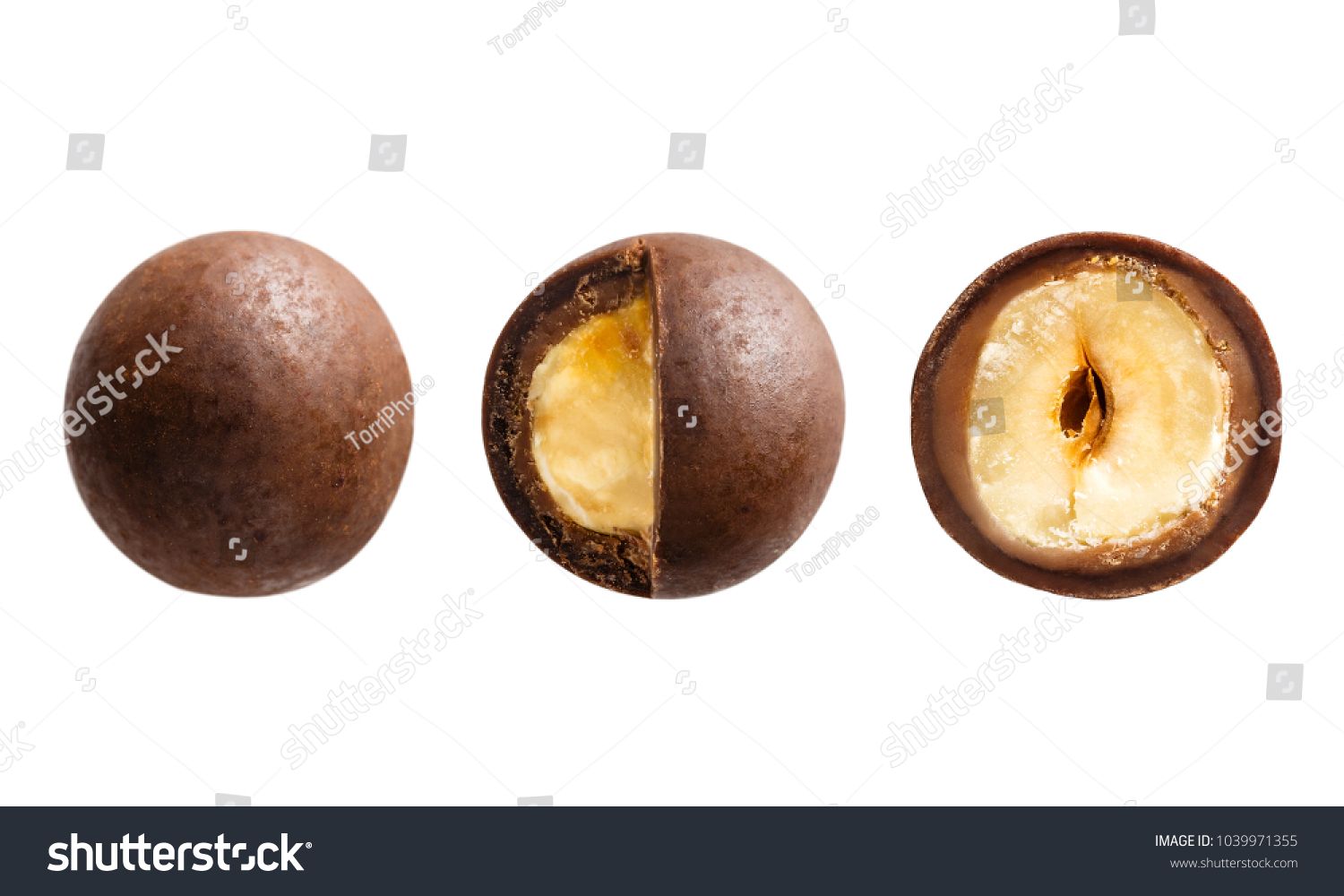 Sugared hazelnut dragees in chocolate isolated on white background. Chocolate balls candy filled with nut #1039971355