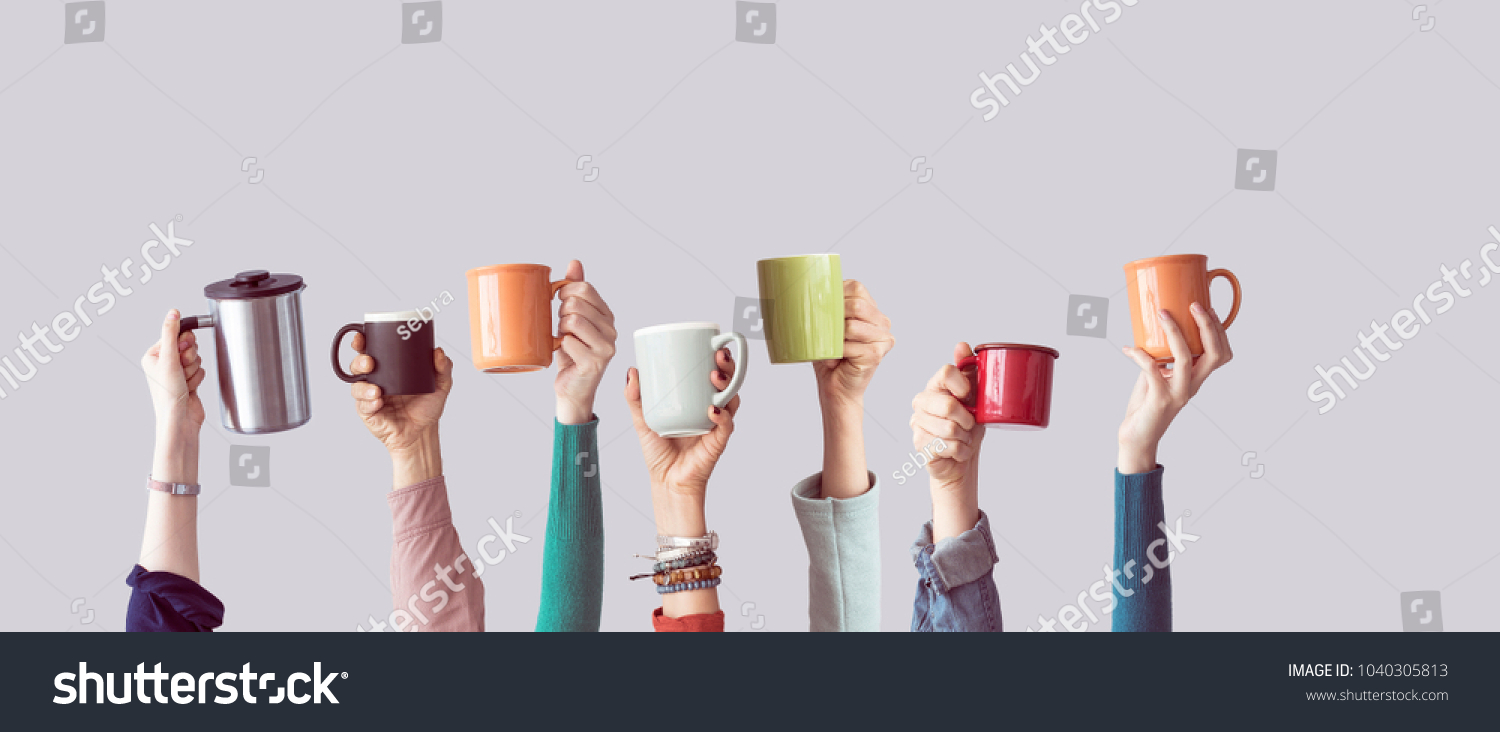 Many different arms raised up holding coffee cup #1040305813