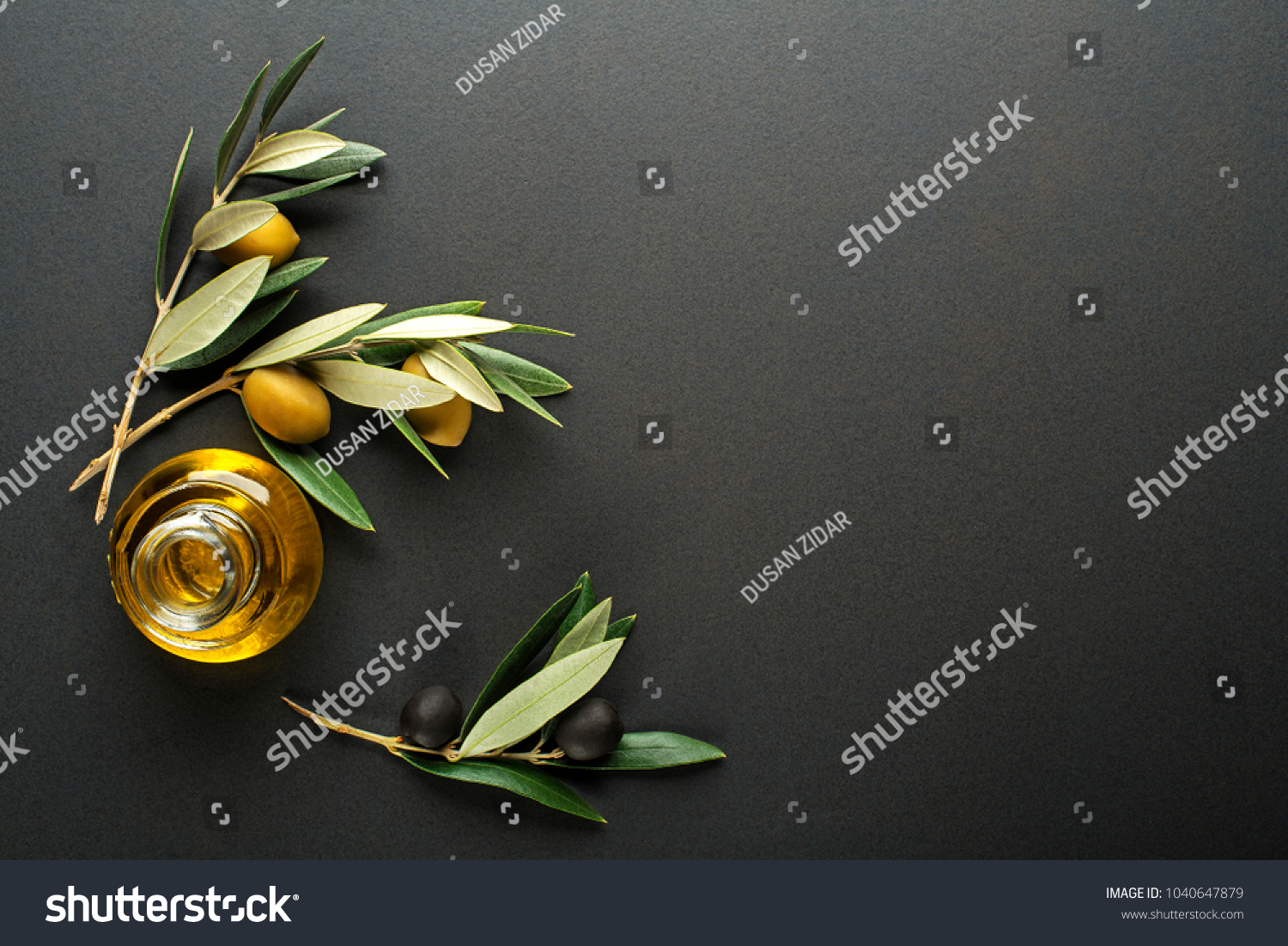 Olive oil and olive branch on black background #1040647879