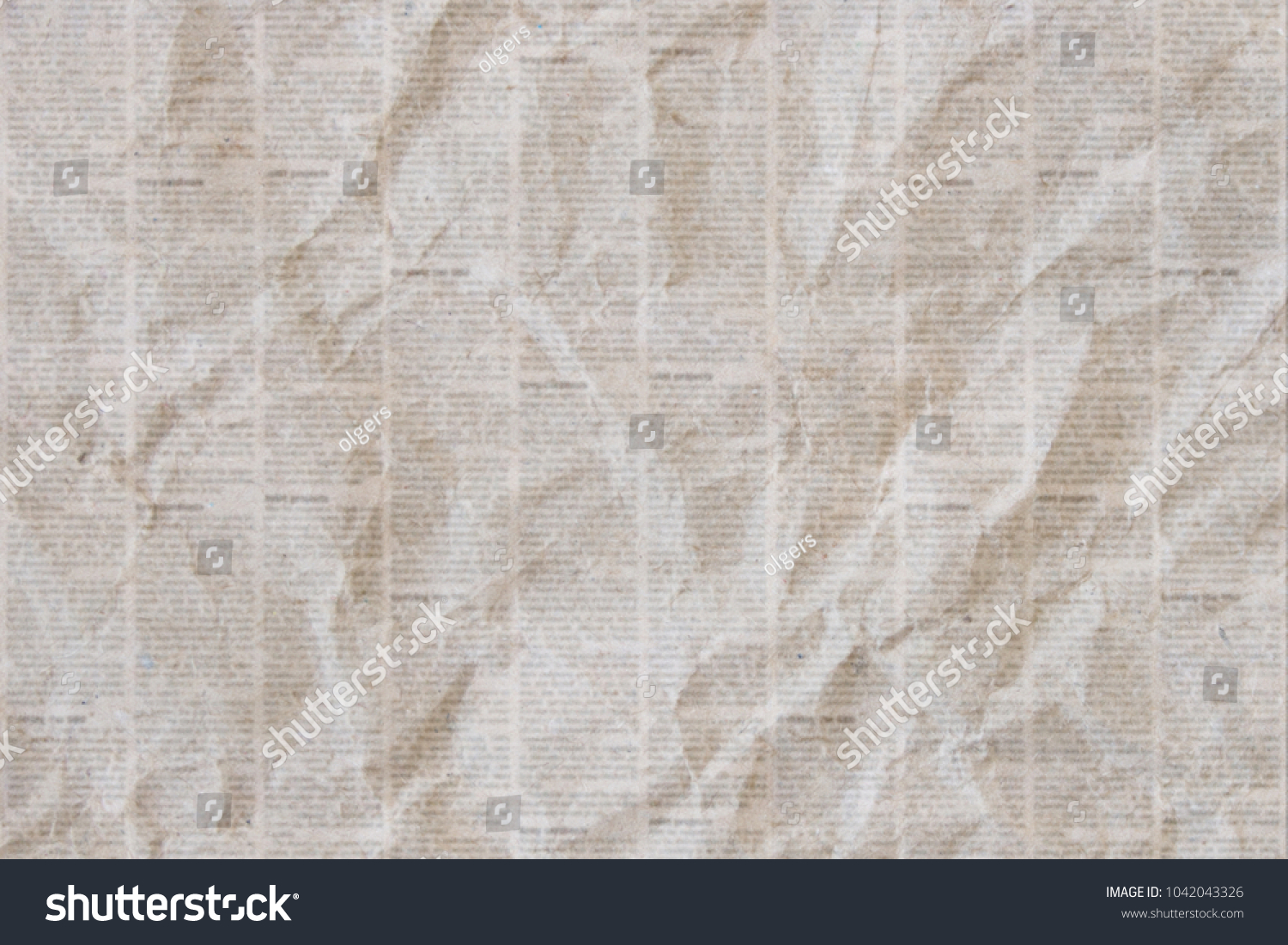 Old crumpled grunge newspaper paper texture background. Blurred vintage newspaper background. Crumpled paper textured page. Gray brown beige collage news paper background. #1042043326