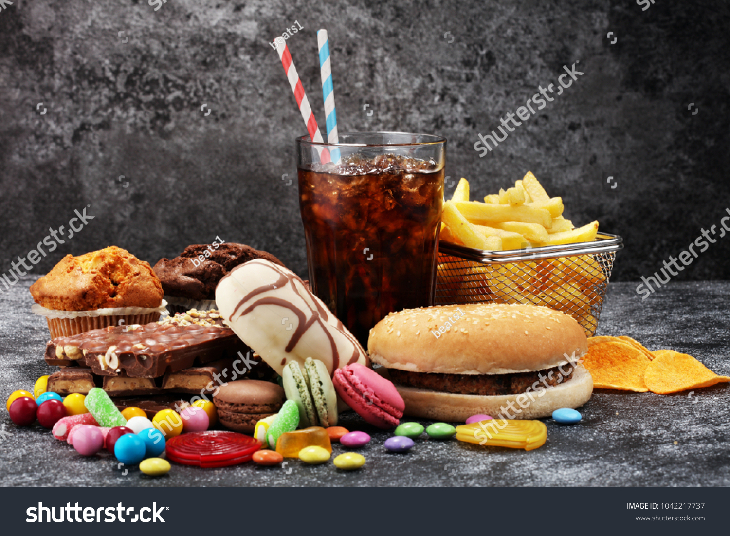 Unhealthy products. food bad for figure, skin, heart and teeth. Assortment of fast carbohydrates food.  #1042217737