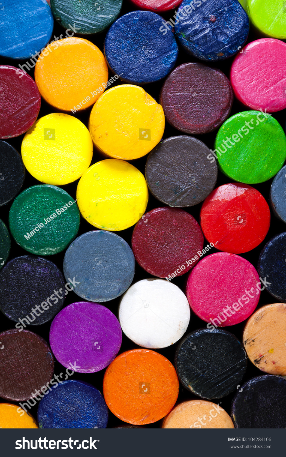 Colorful pattern of a pile of crayons. #104284106