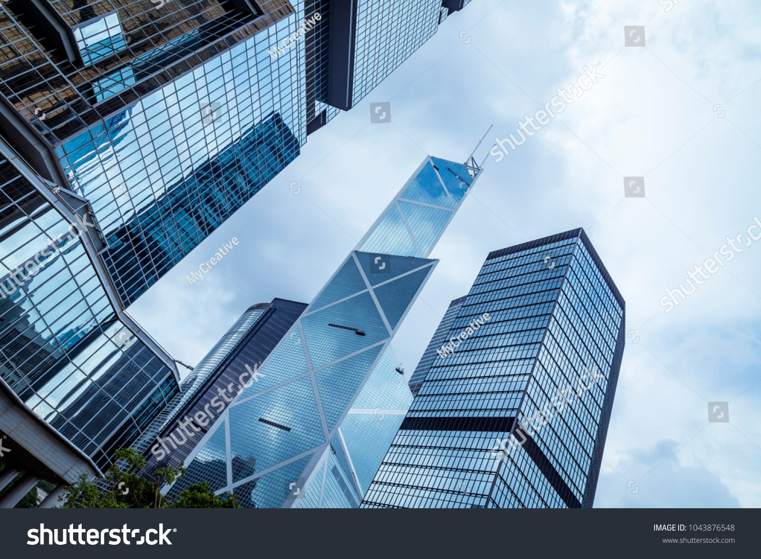Bottom view of office building window close up in hongkong city
 #1043876548