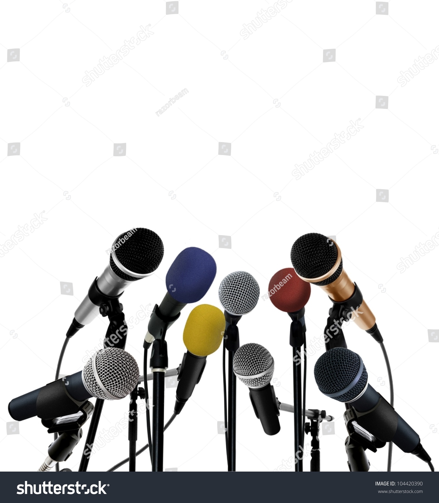 Press conference with standing microphones #104420390