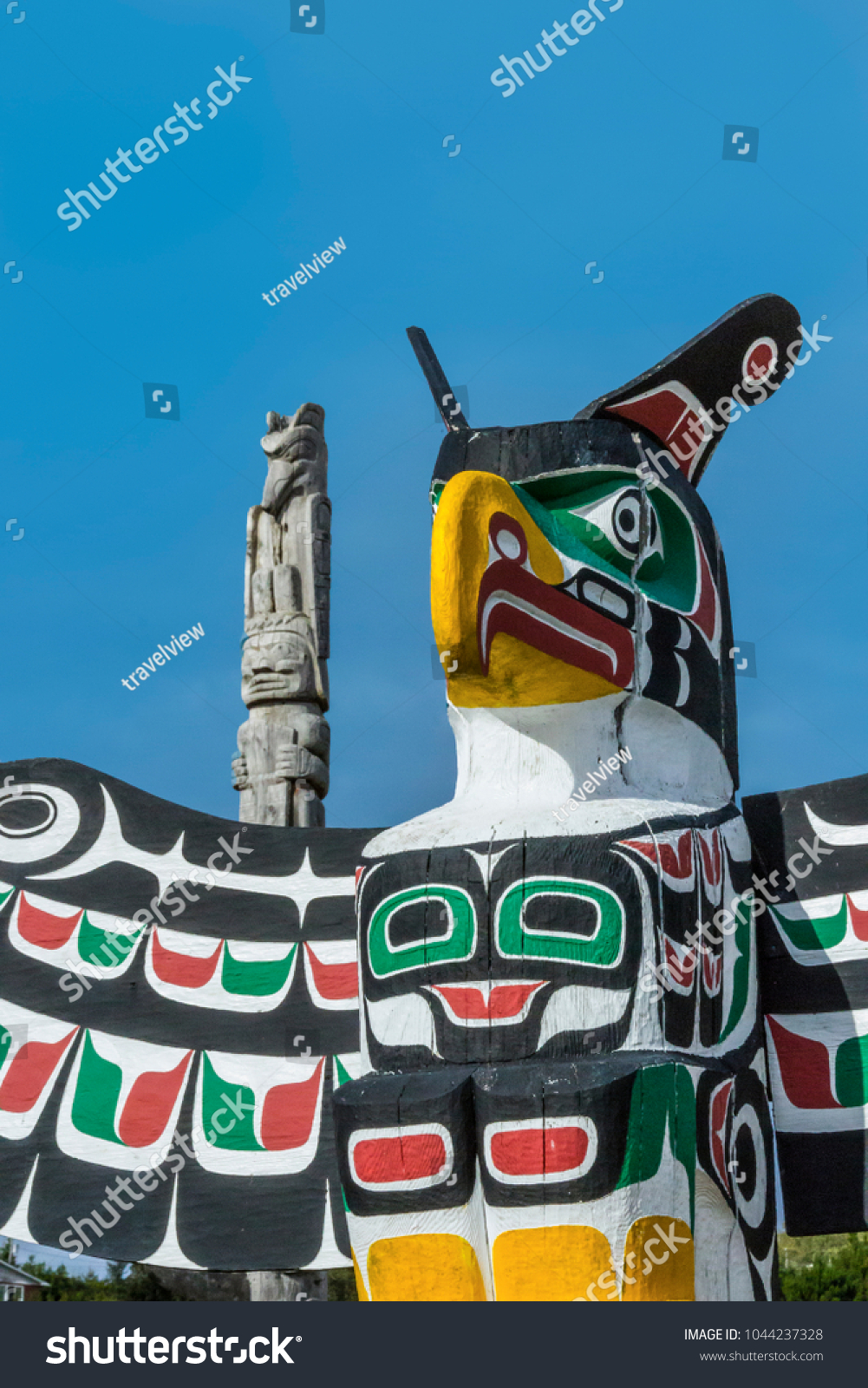 old traditional wooden totem masks in Canada #1044237328
