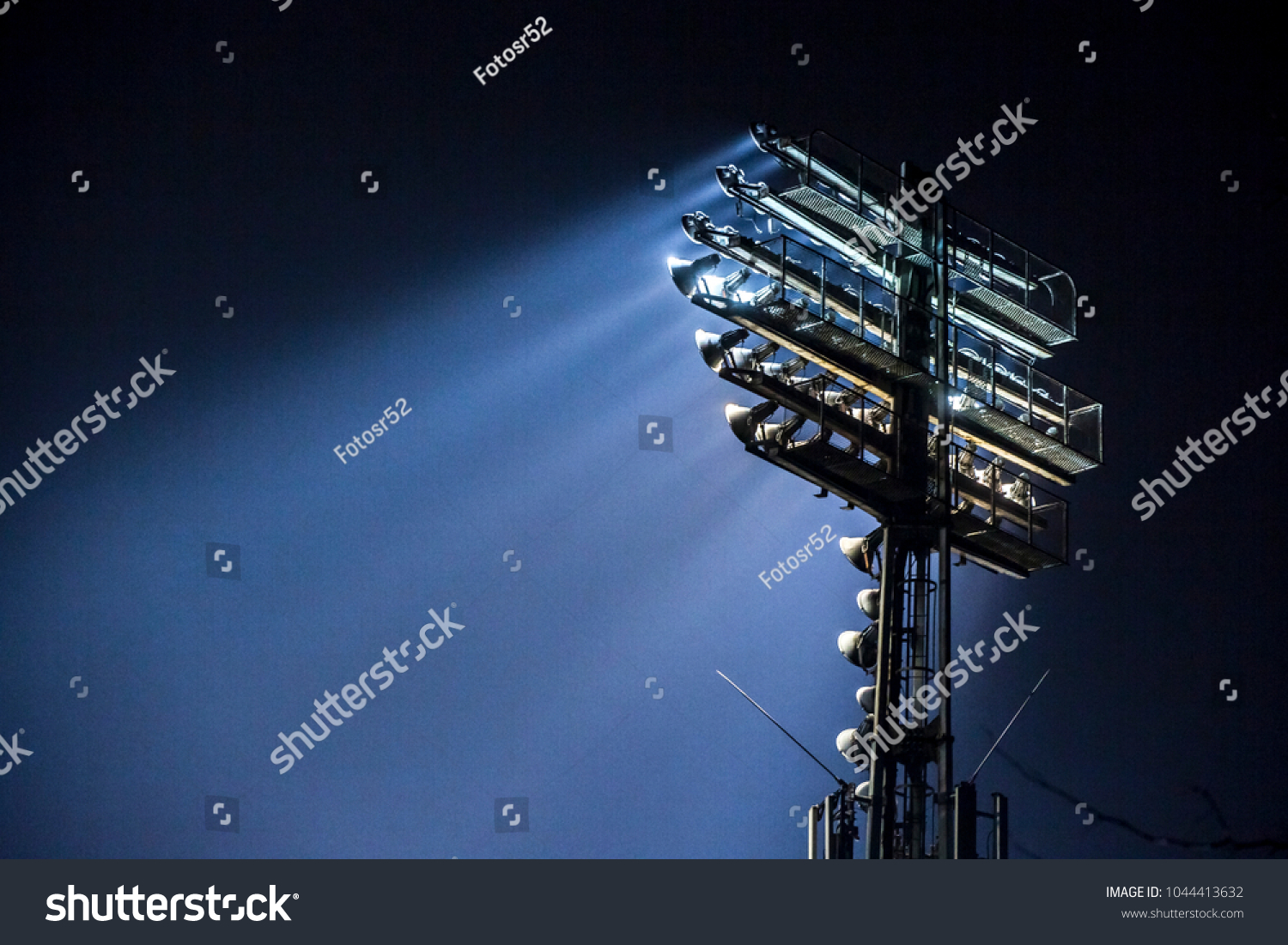 Stadium lights at an sport arena stadium #1044413632