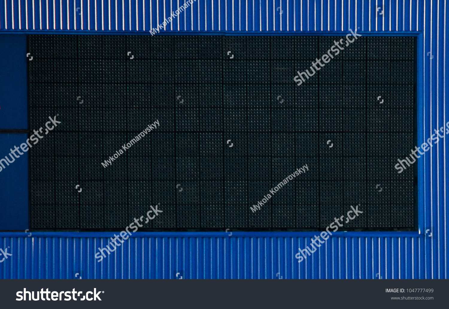 A large blank electronic advertisement board  #1047777499