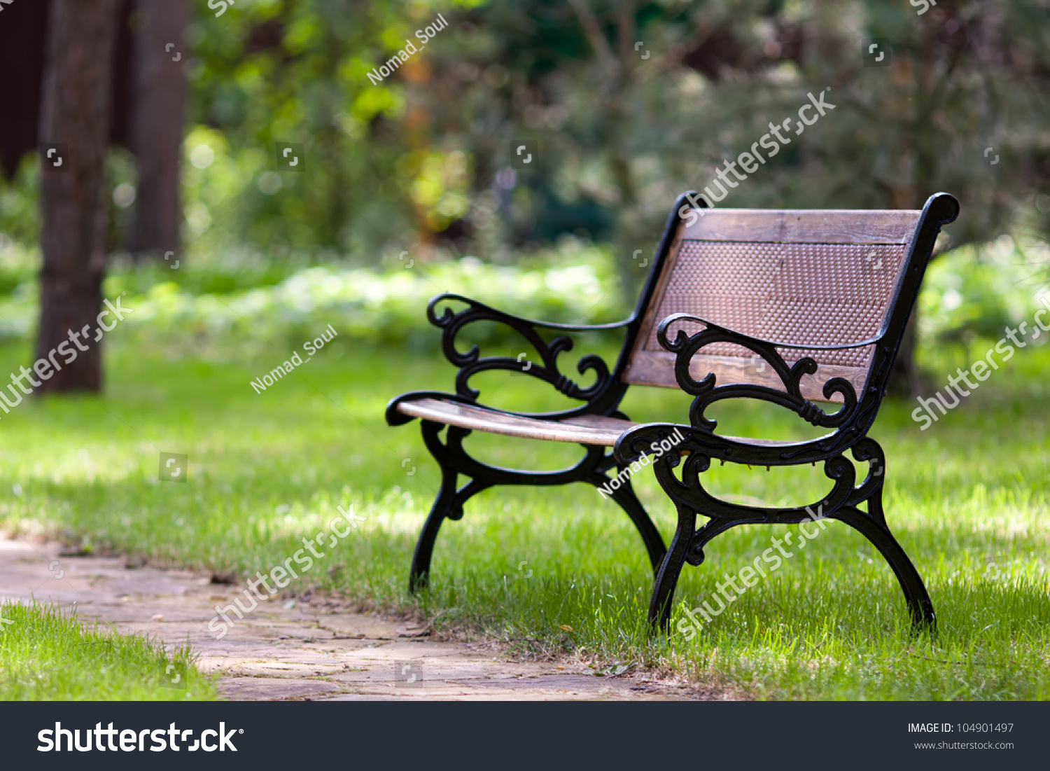 Stylish bench in summer park #104901497