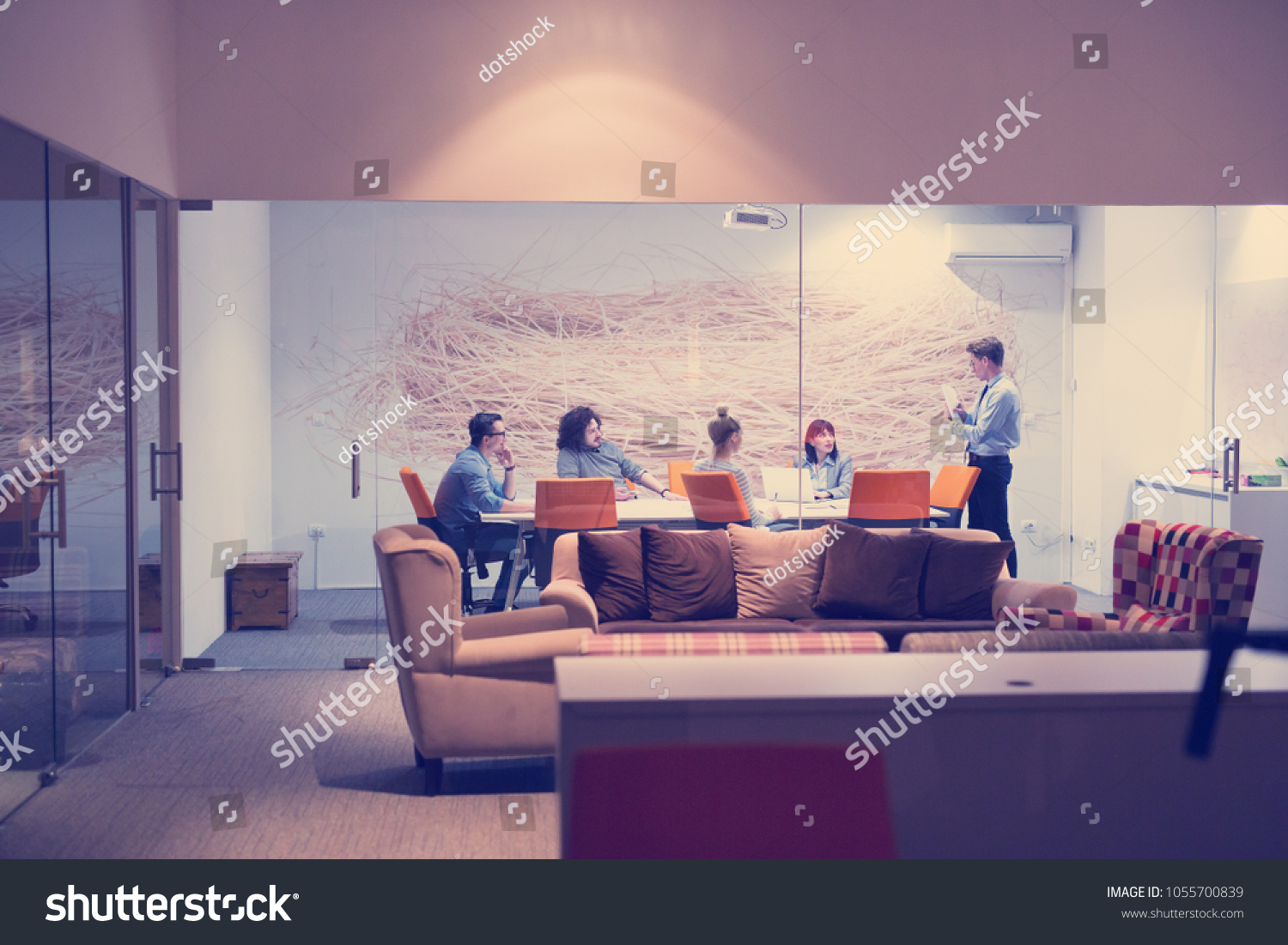 Group of business people discussing business plan  in the office #1055700839