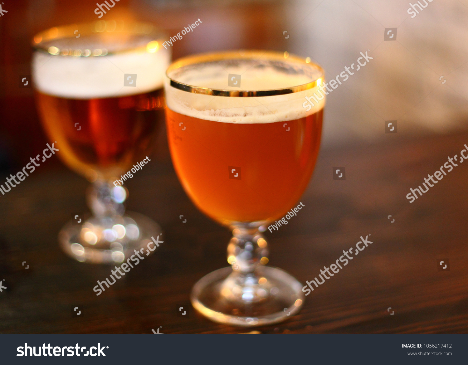 Typical traditional belgium draft beer, cold beer with foam #1056217412