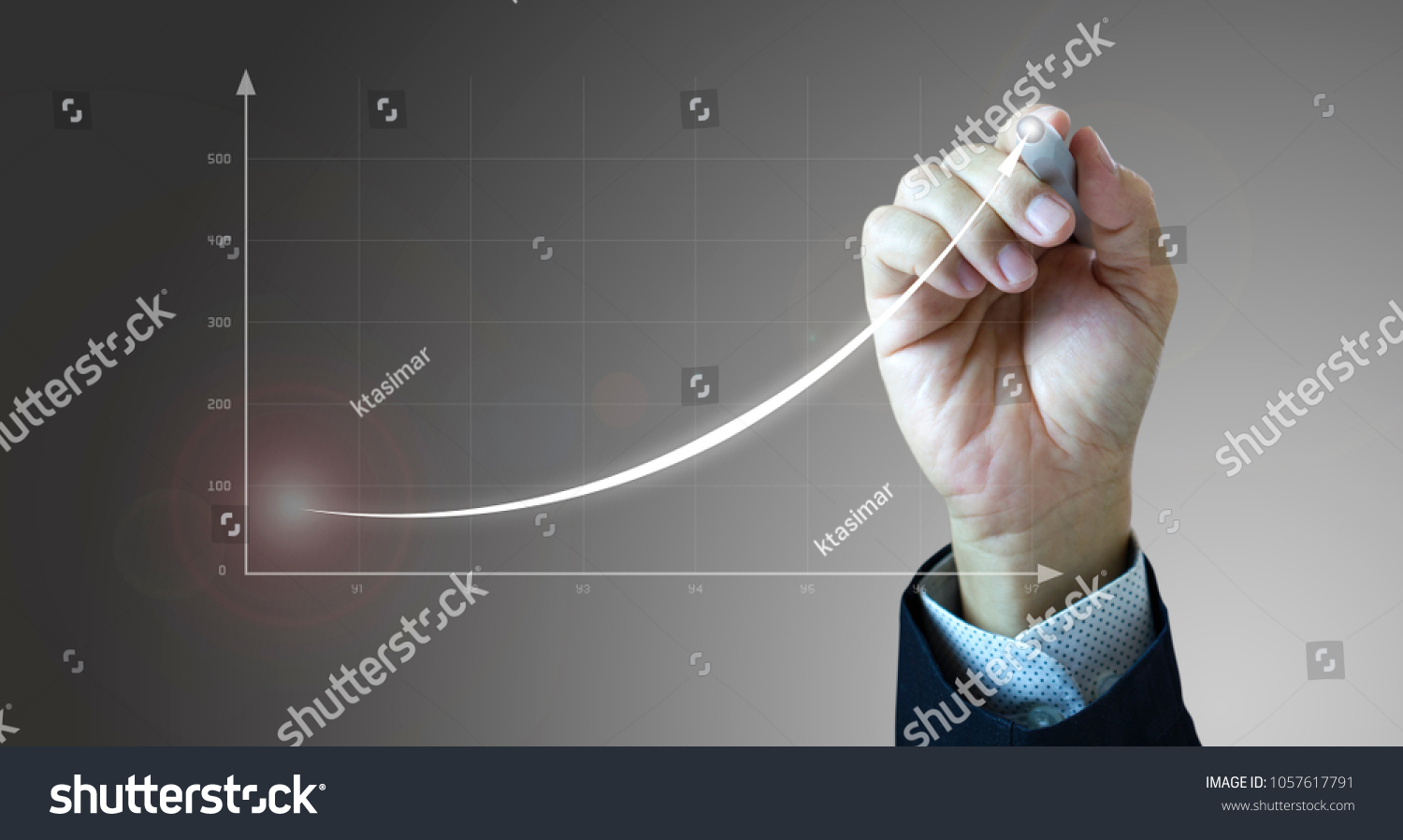 Close up of a businessman's hand drawing an exponential line curve showing of business growth and success rapidly. #1057617791