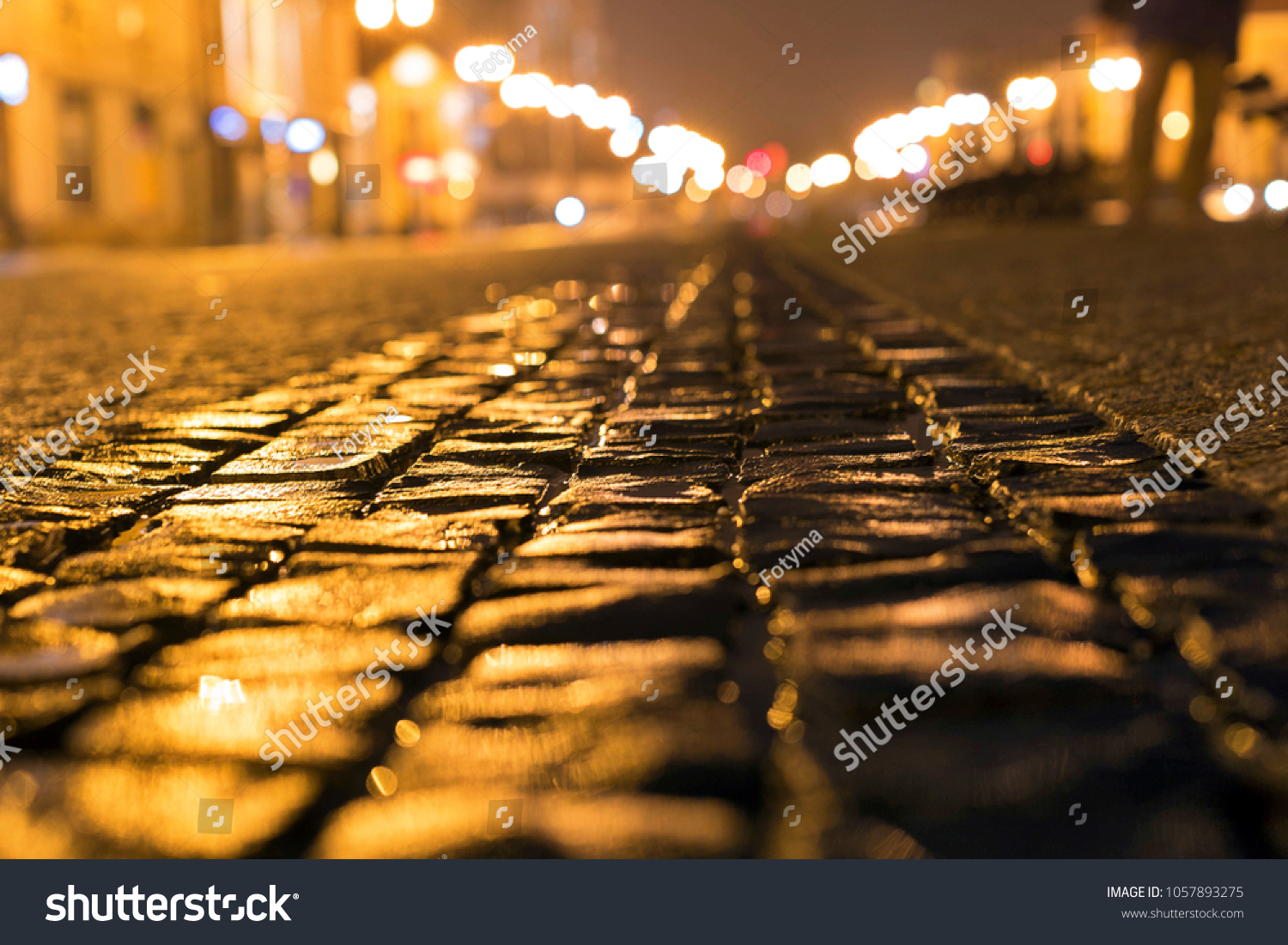 City street illuminated with the night lights #1057893275