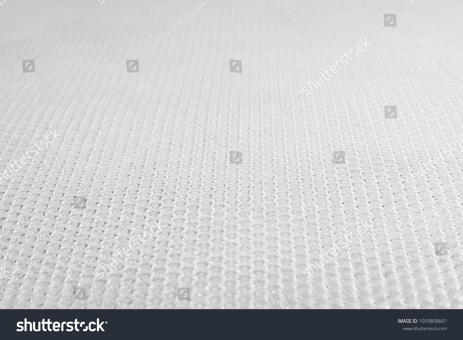 Dotted light gray abstract background. Texture from dots wallpaper. #1059808601