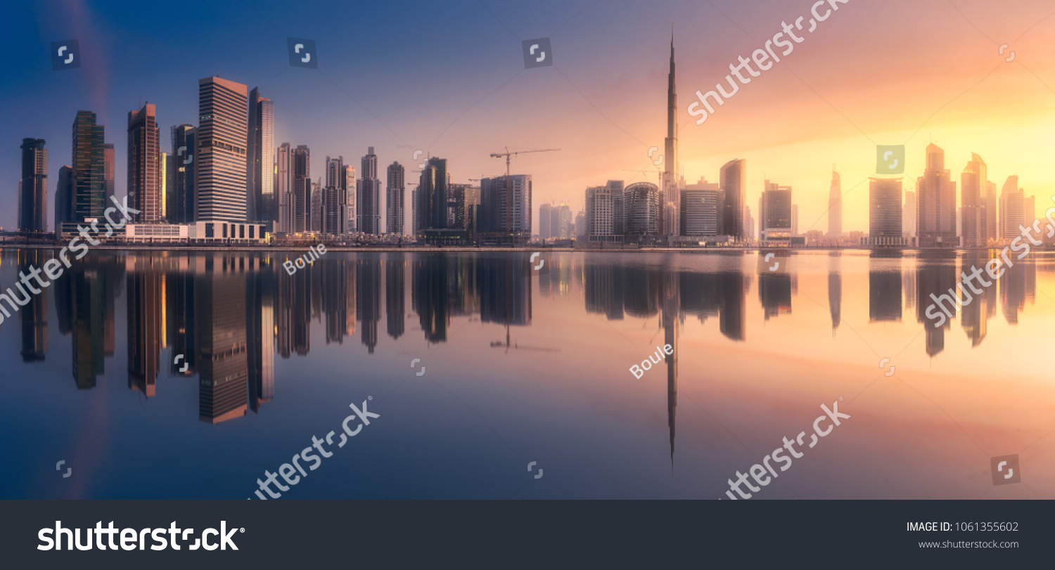 Mystical panoramic view of Dubai Business bay with purple sunrise, UAE #1061355602