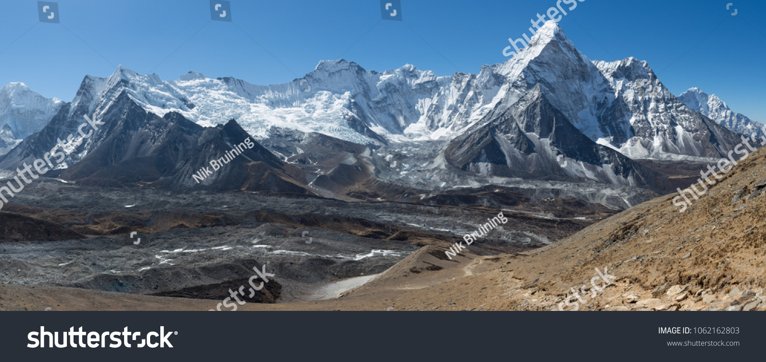 Panorama of a mountain range including one of the most beautiful mountains in the world 'Ama Dablam'  in the Himalayas, Nepal. #1062162803