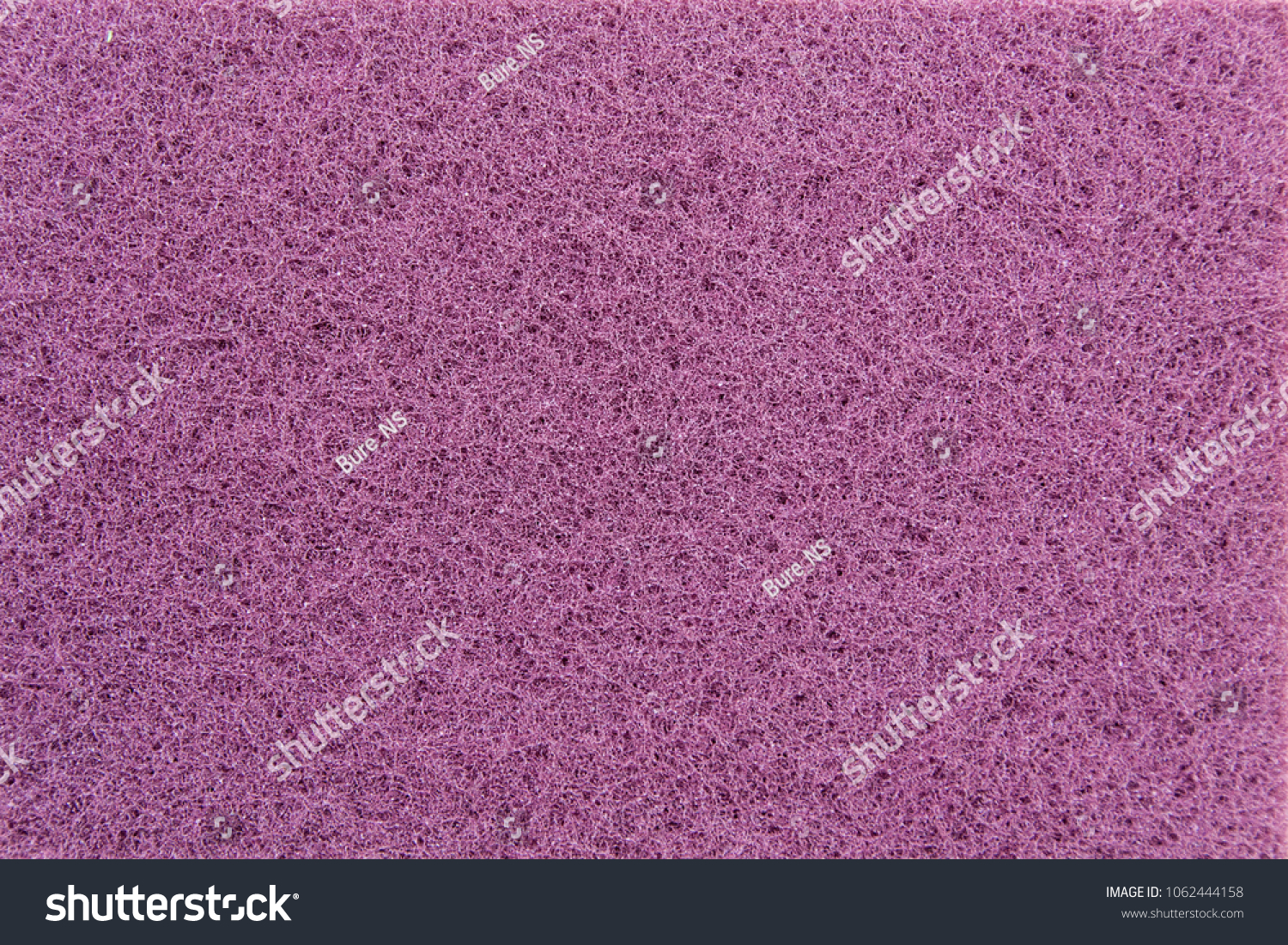 Background of textile material. Polishing material for metal surfaces #1062444158