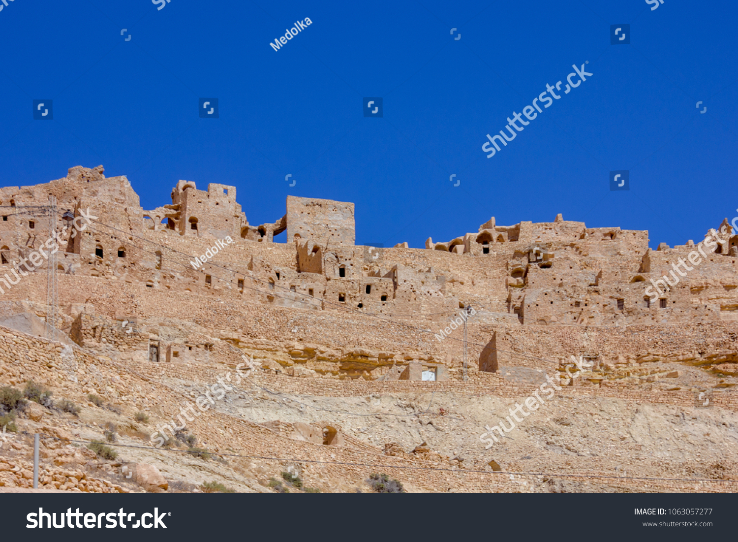 Berber village in the sandstone mountain in the Sahara, Africa
 #1063057277