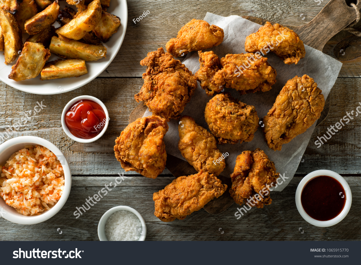 Delicious homemade crispy fried chicken with taters and coleslaw. #1065915770