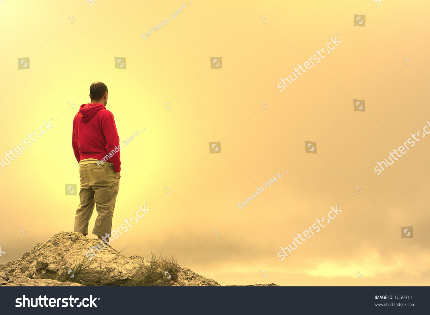 man in meditation on top of the mountain at sunset #10693111
