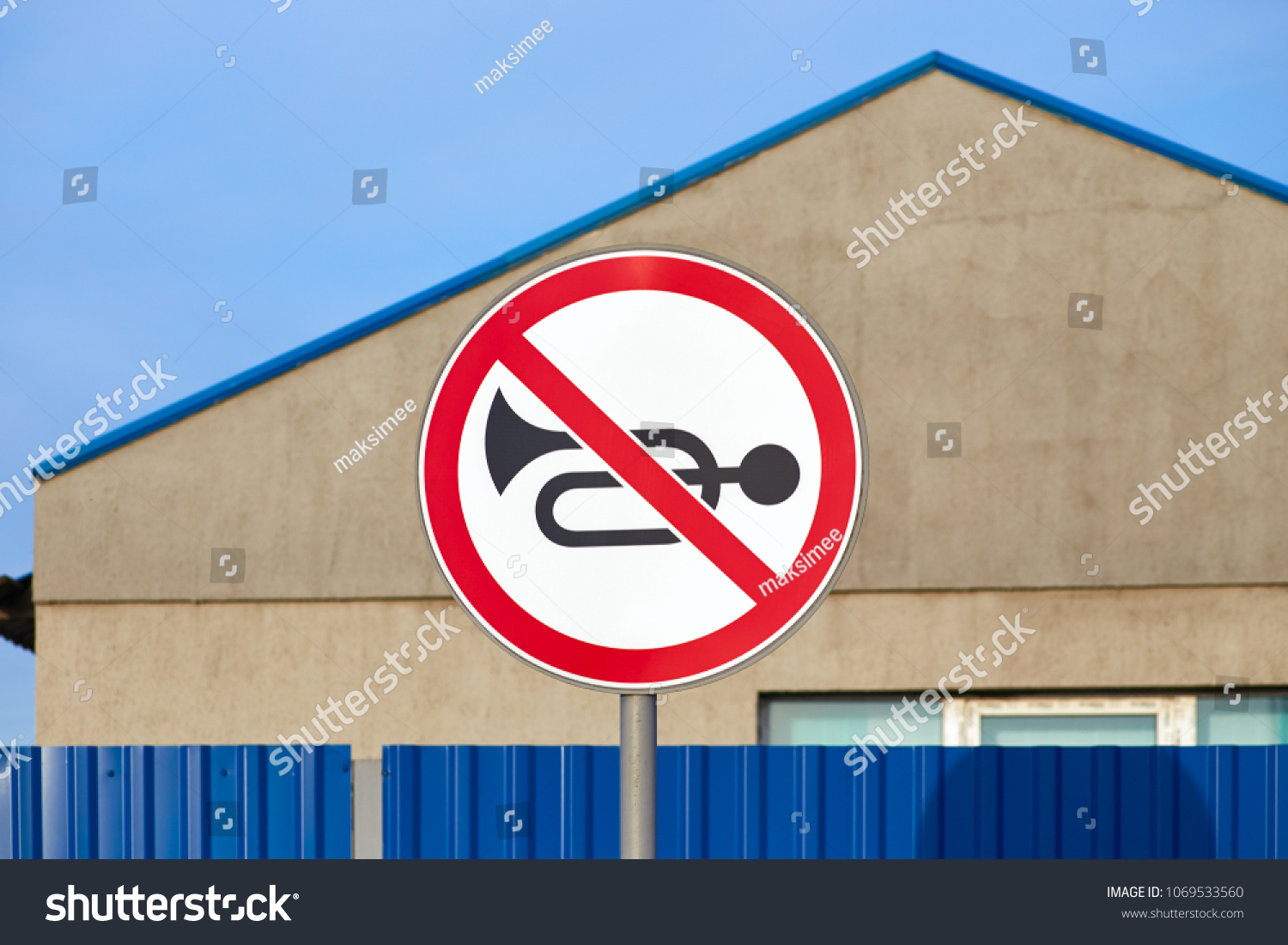 Traffic road sign no horn on blue sky background
 #1069533560