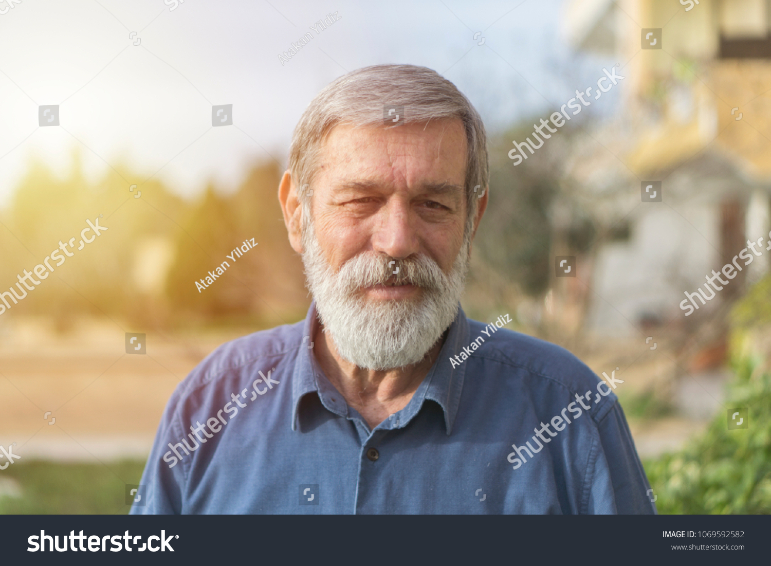 Portrait of a senior man  #1069592582