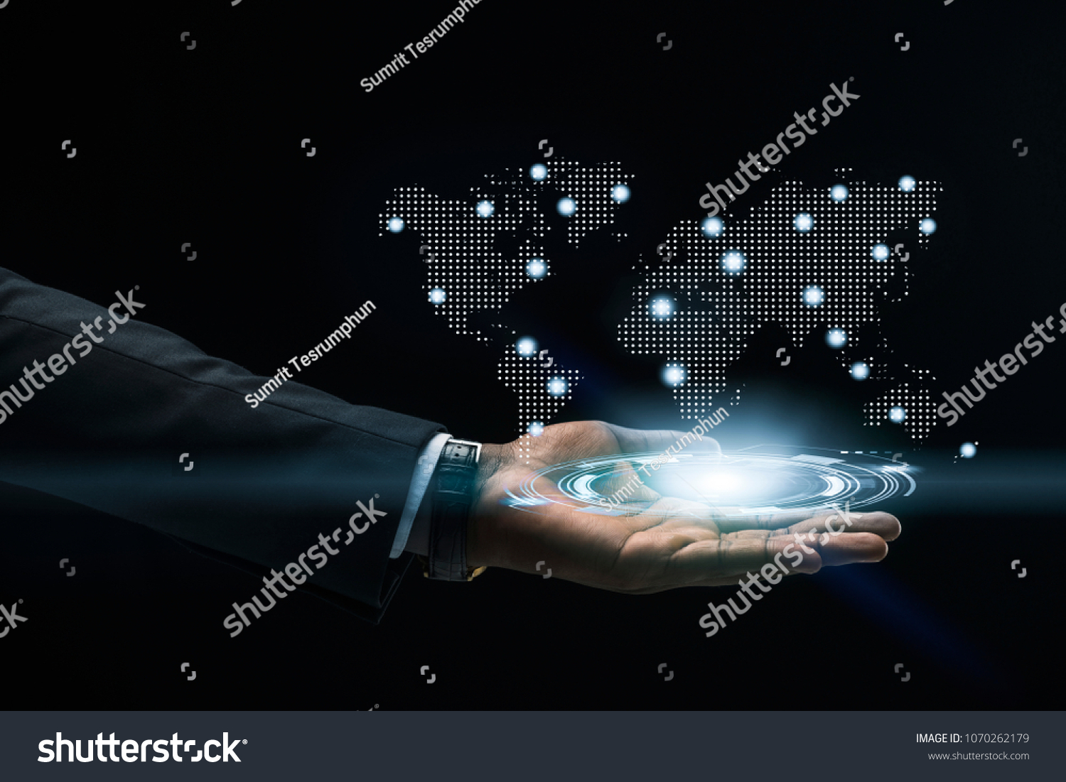 Abstract art of Hand of Business man Holding the virtual hologram future system.  Innovation Business Financial and Technology concept. #1070262179