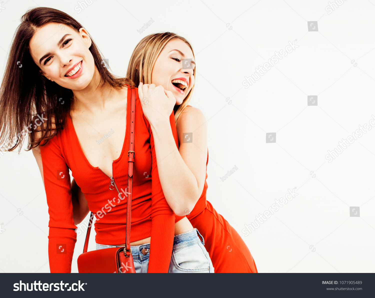 best friends teenage girls together having fun, posing emotional #1071905489