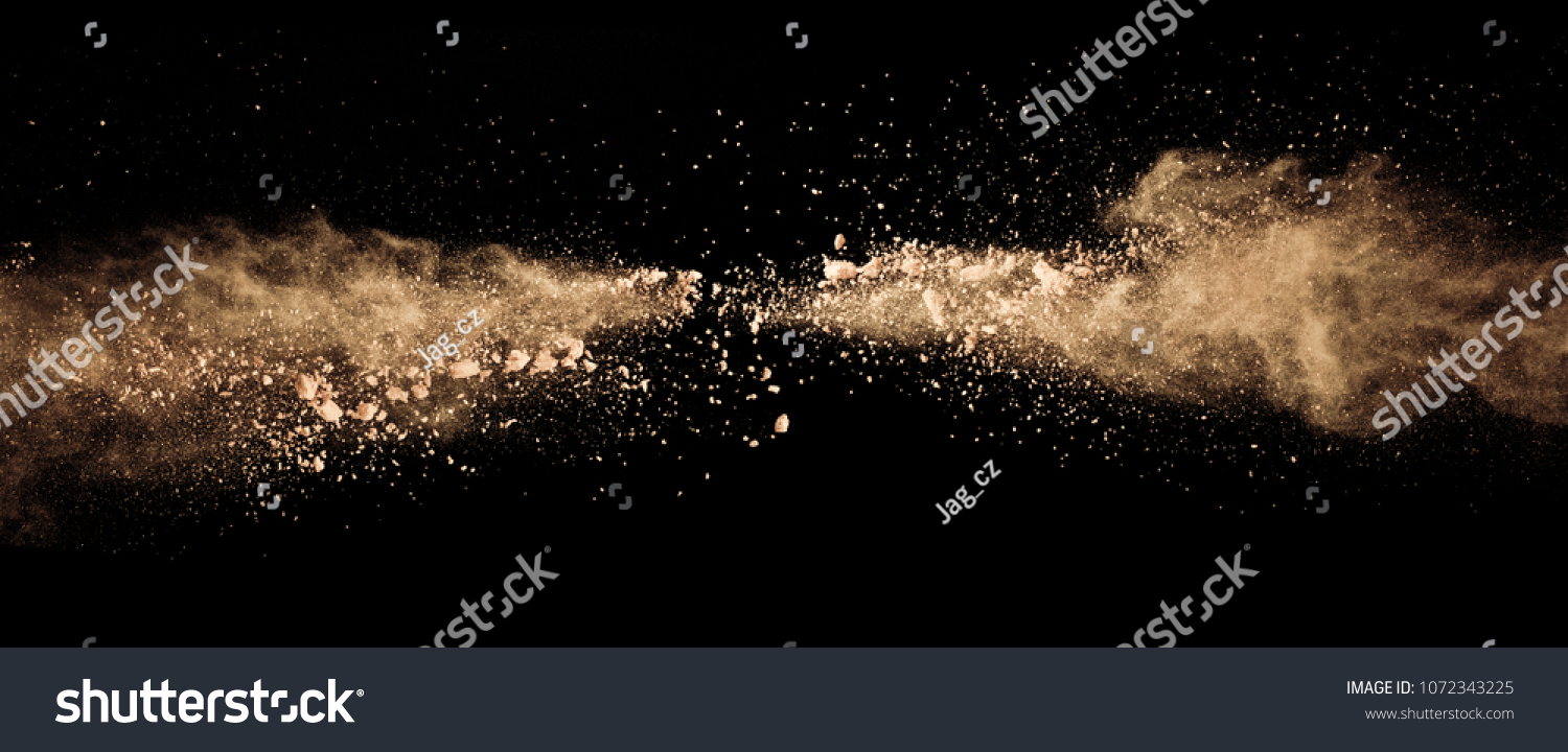 Abstract colored brown powder explosion isolated on black background. High resolution texture #1072343225