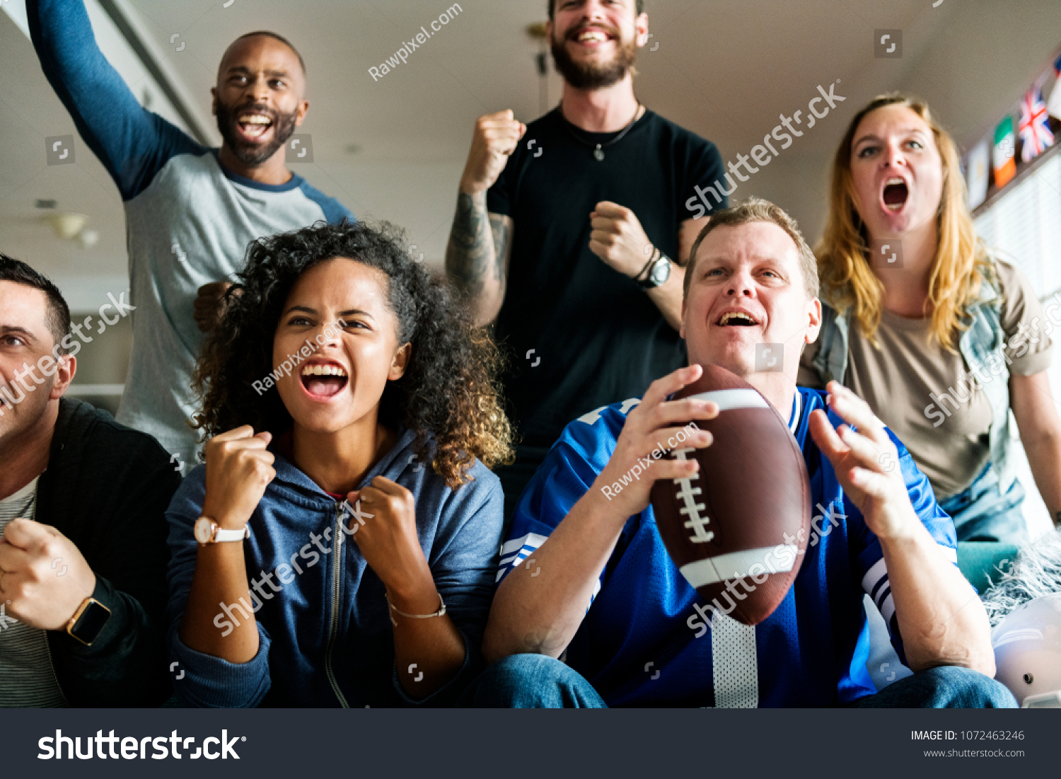 Friends cheering sport league together #1072463246