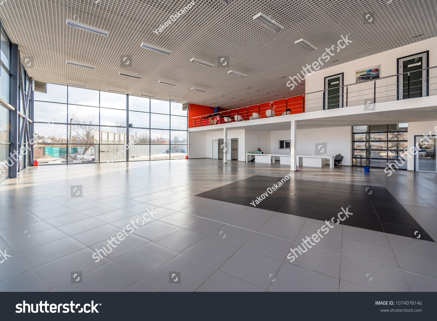 Interior of empty car dealership #1074078146
