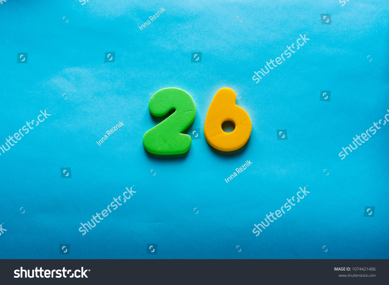 26 years old celebrating classic logo. Colored happy yellow green numbers. Greetings celebrates card. Traditional digits of ages. Sale, special prize, % off concept. #1074421406