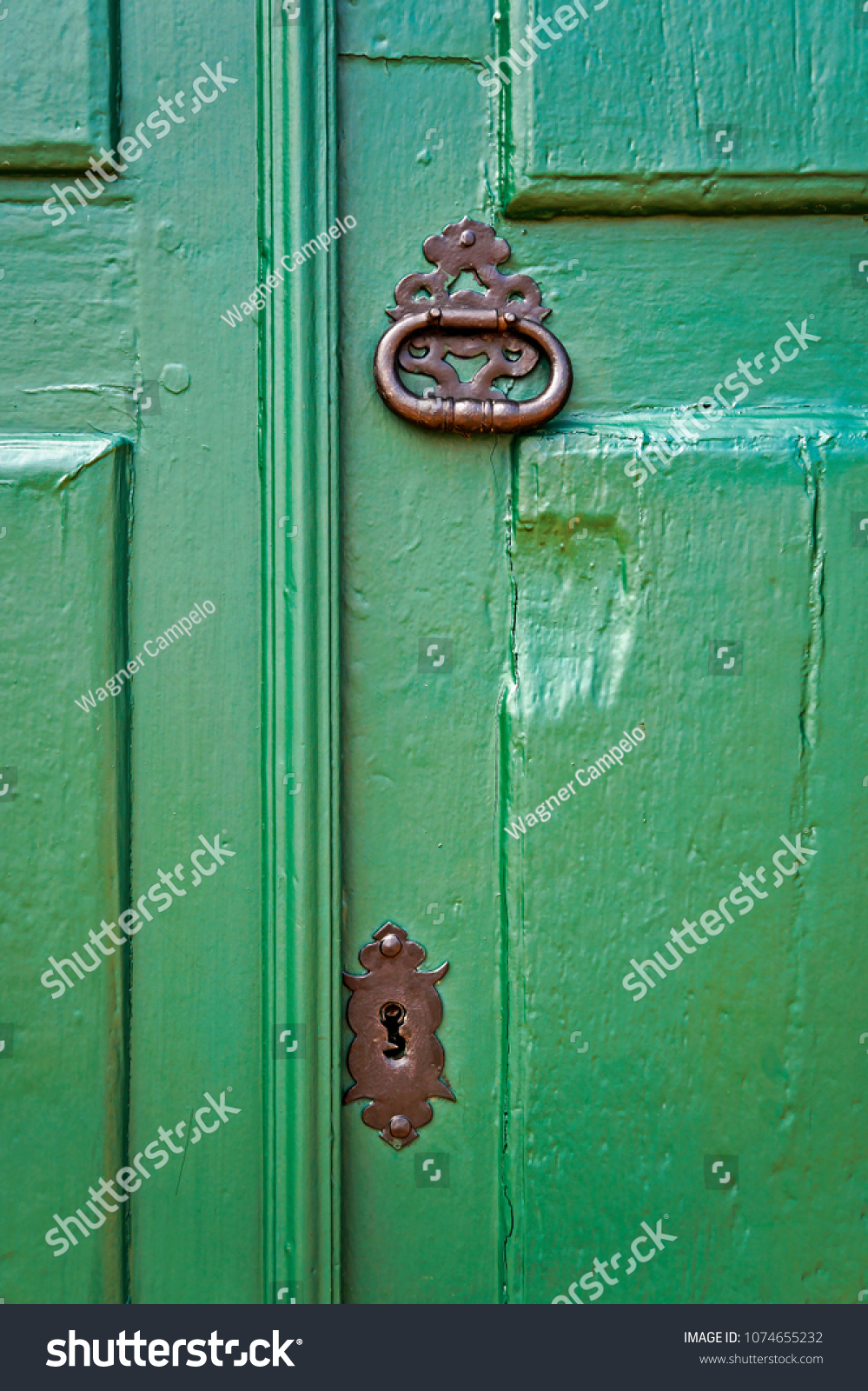 Ancient colonial door detail, Tiradentes, Minas Gerais, Brazil #1074655232