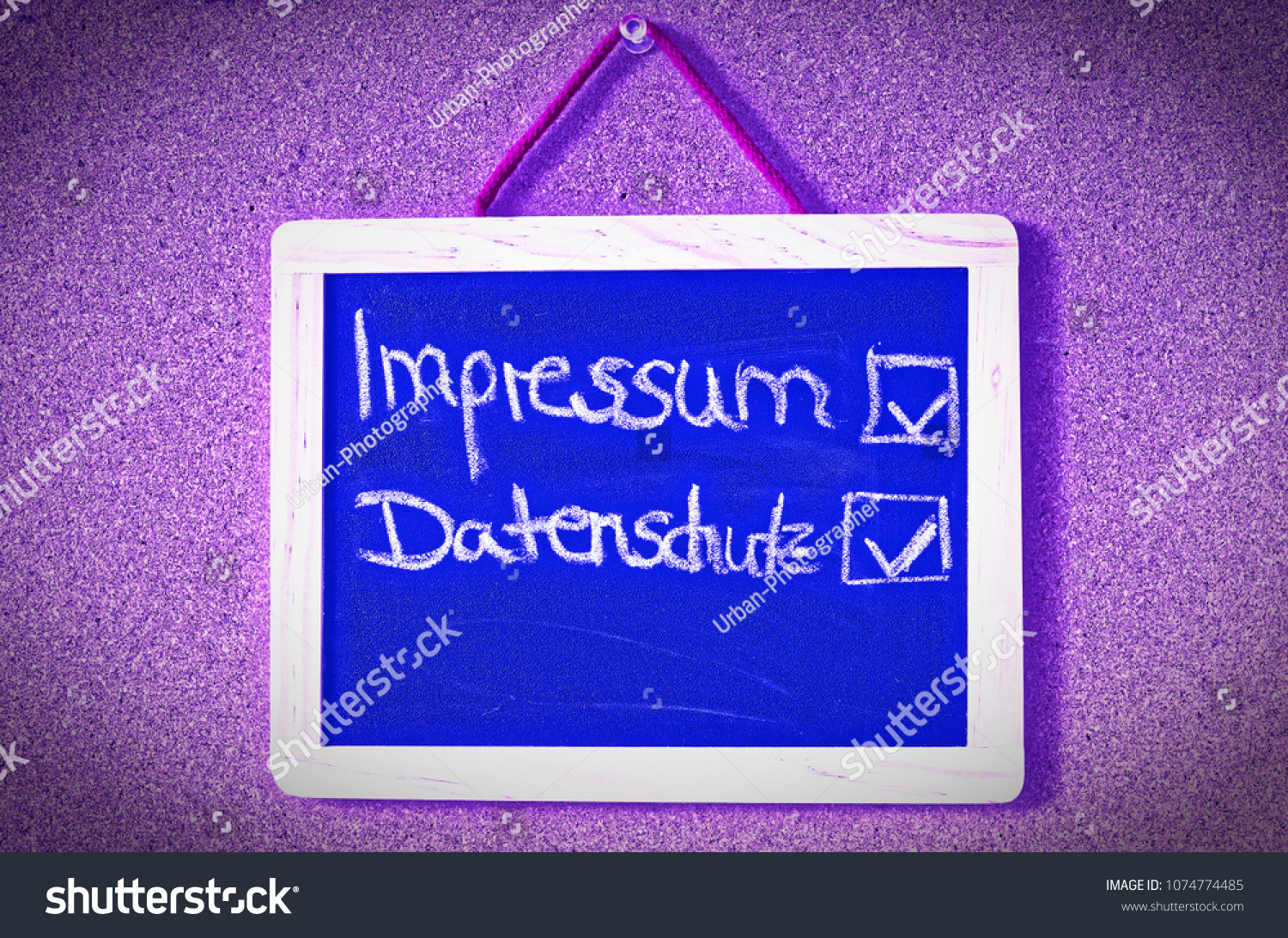 Board with the inscription in german Impressum und Datenschutz in english Imprint and Privacy #1074774485