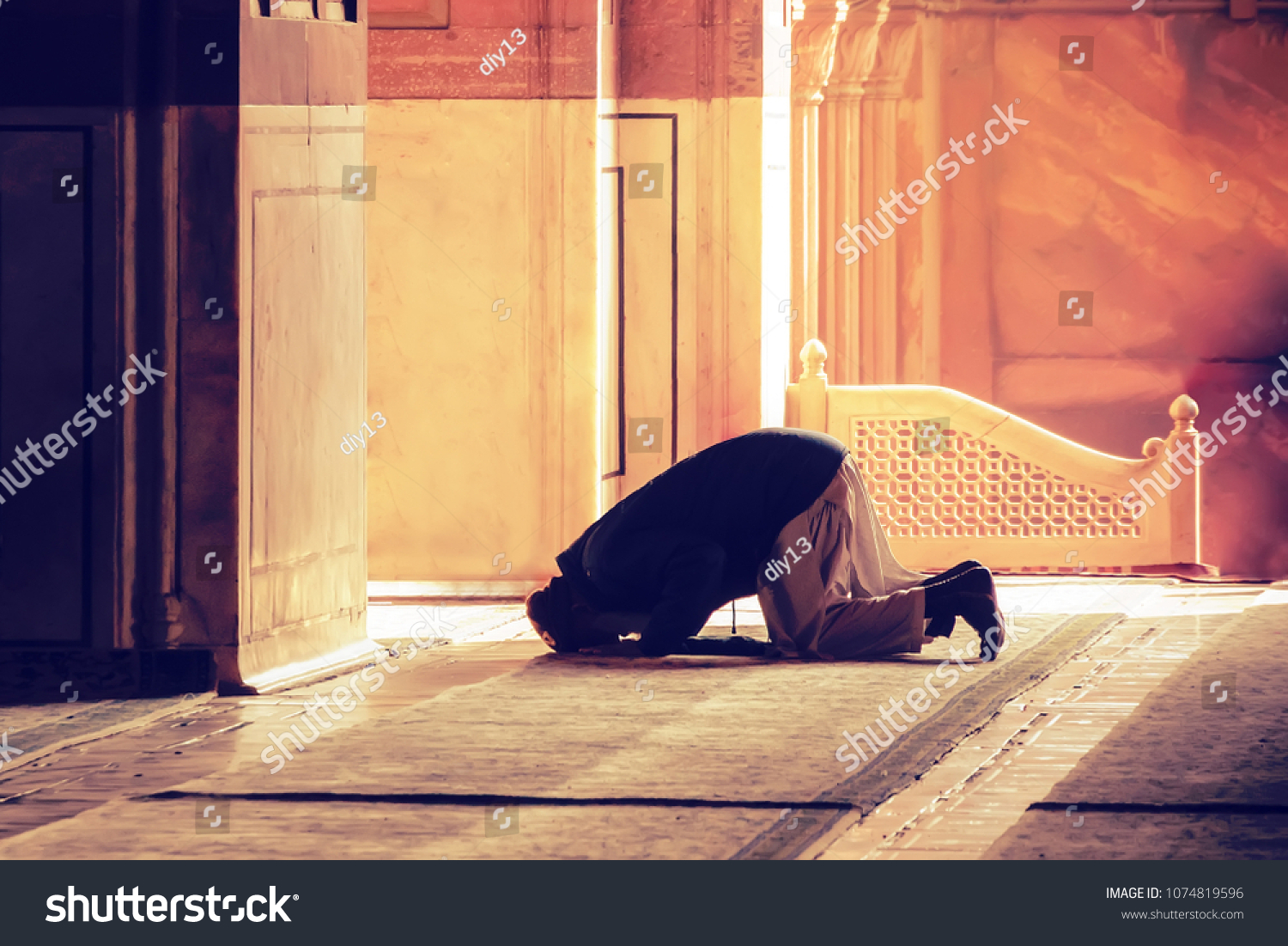 The muslim prayer for god in the mosque. Old iranian Muslim is on his knees praying. Holy month of Ramadan Muslims. Moslem, mohammedan, muslimah. monk, friar, monastic, #1074819596