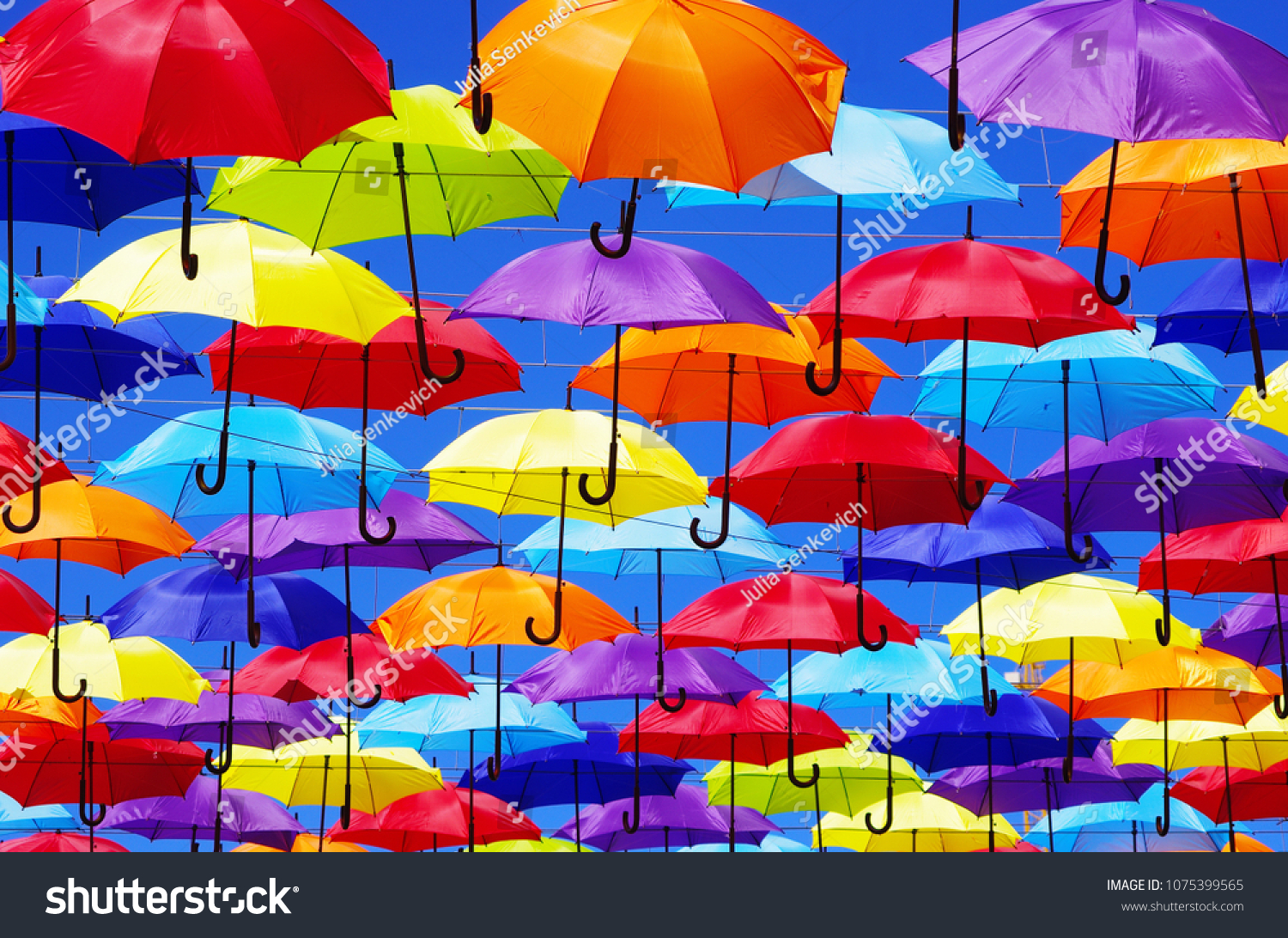 colorful bright umbrellas  street decoration #1075399565