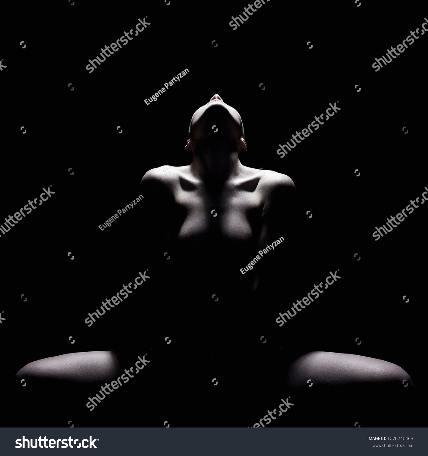 Nude Young Woman silhouette in the dark. Beautiful Sexy Naked Body Girl #1076740463